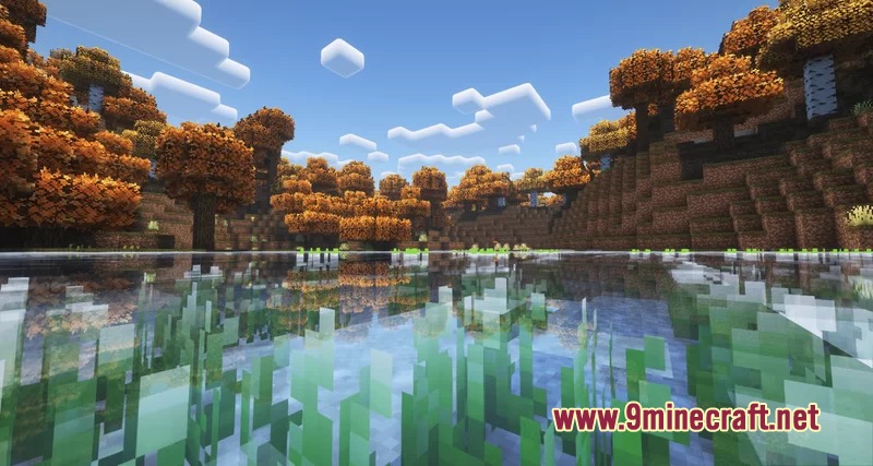 Autumn Fall Resource Pack Screenshot 4 A clear lake reflects vibrant orange autumn trees under a blue sky