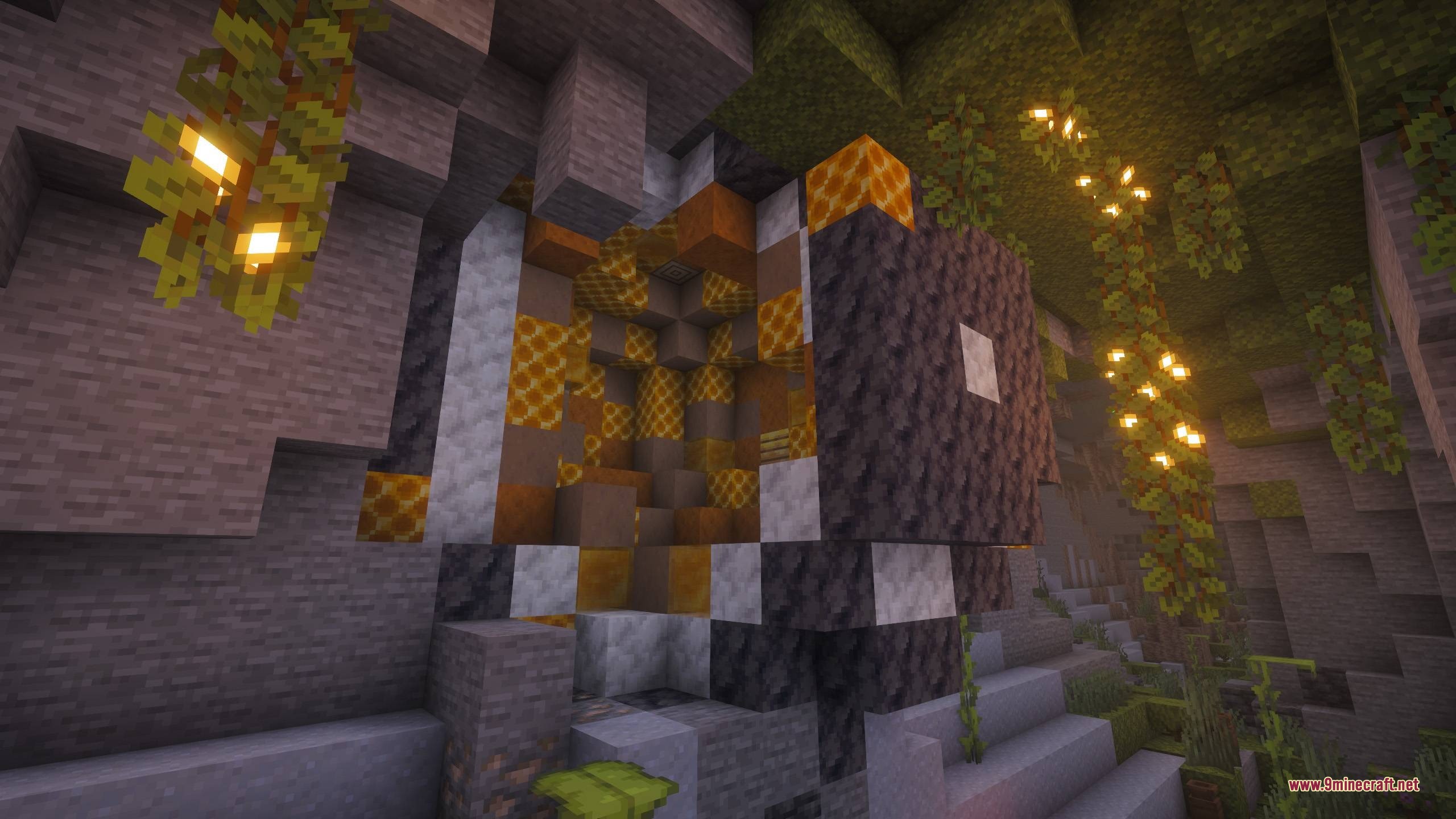 BM More Geodes Data Pack Screenshot 3 A honey geode surrounded by stone and glowing vines in a cave