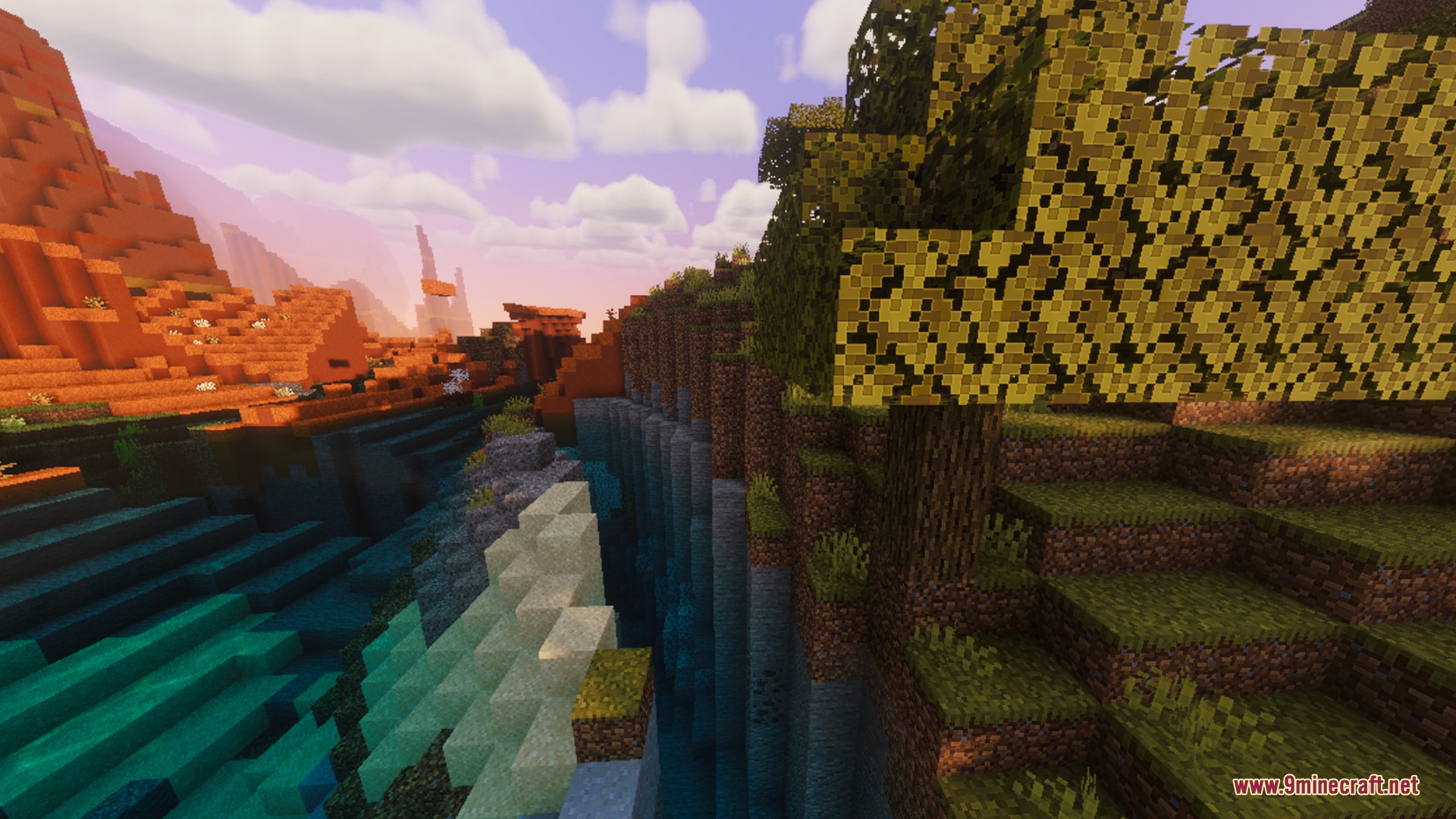 Warm god rays filter through autumn leaves overlooking a colorful canyon and water