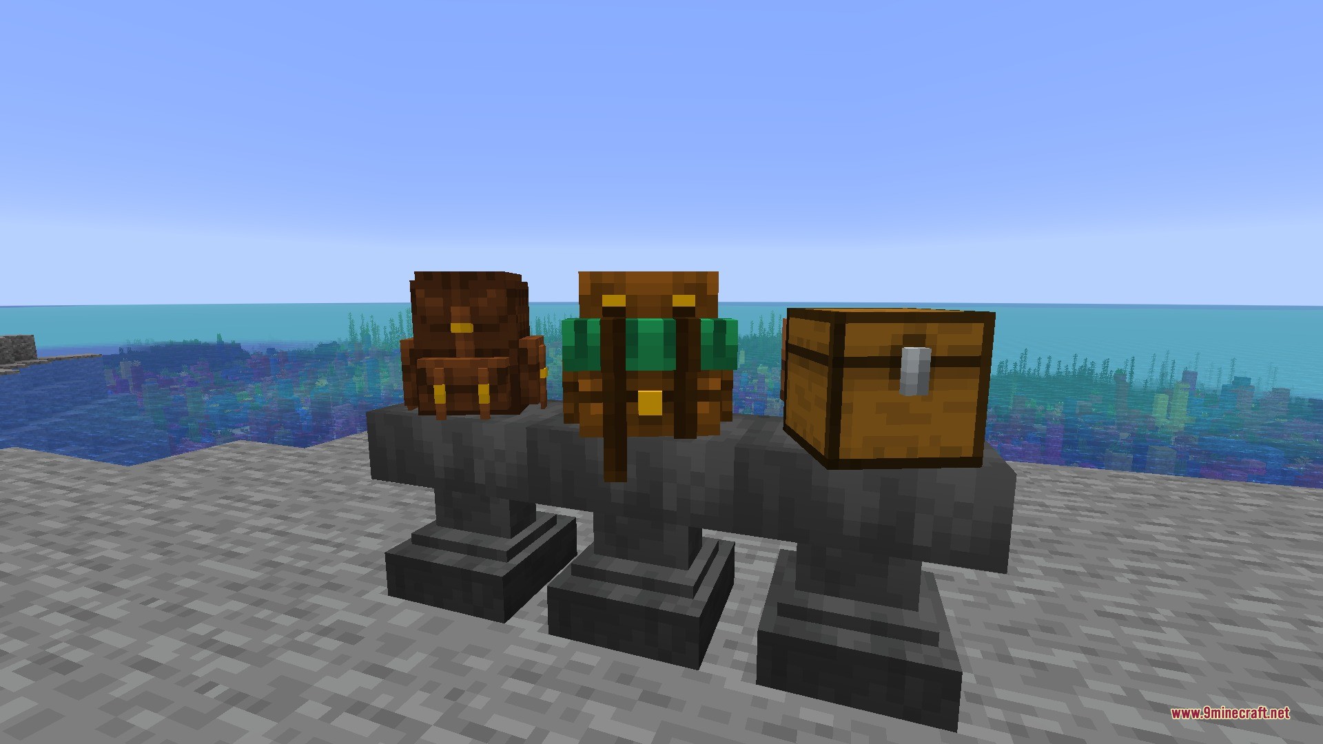 Backpacks & More Data Pack Screenshot 2 Two custom backpacks and a standard chest displayed on top of anvils