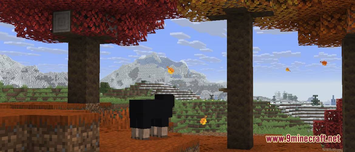 Backport 26.3 Update Mod Screenshot 4 A black sheep explores the colorful Dappled Forest biome near snowy mountains