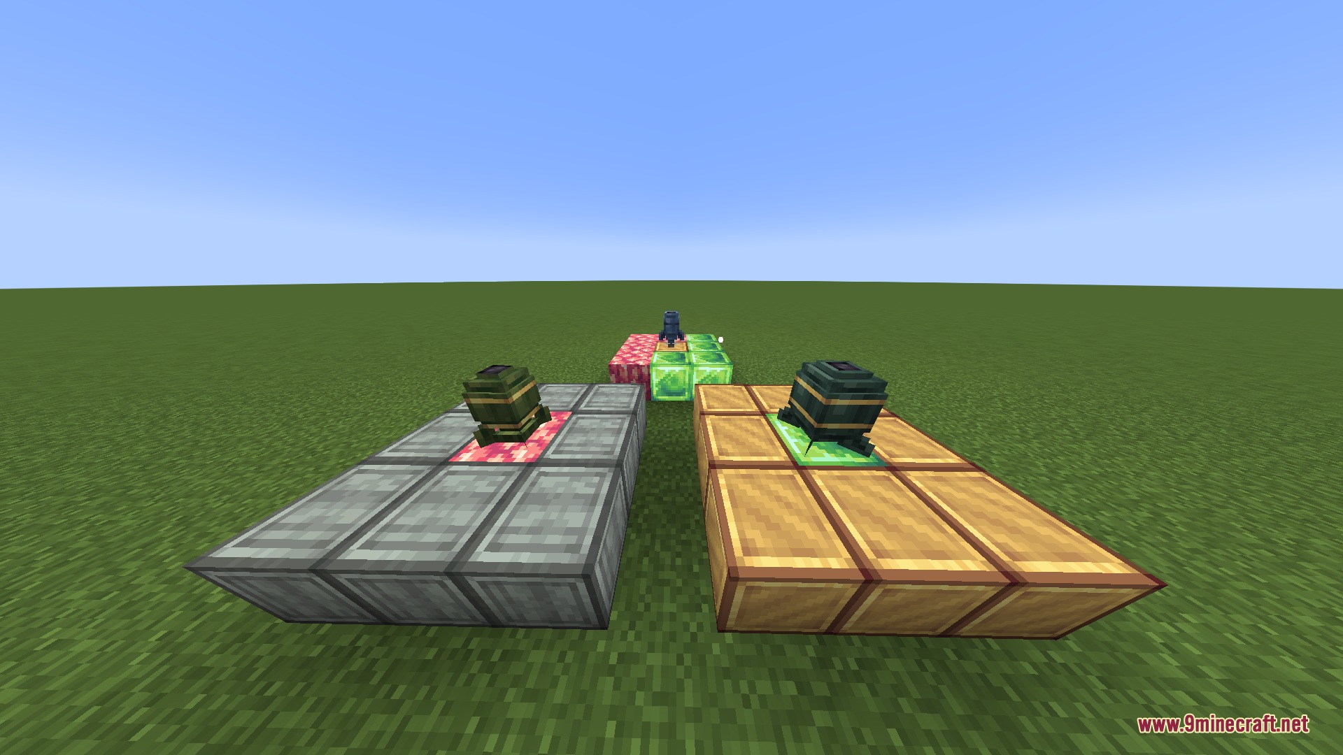 Ballistic Payload Ordnance Mod Screenshot 5 Two explosive bomb blocks placed on stone and wooden platforms in Minecraft