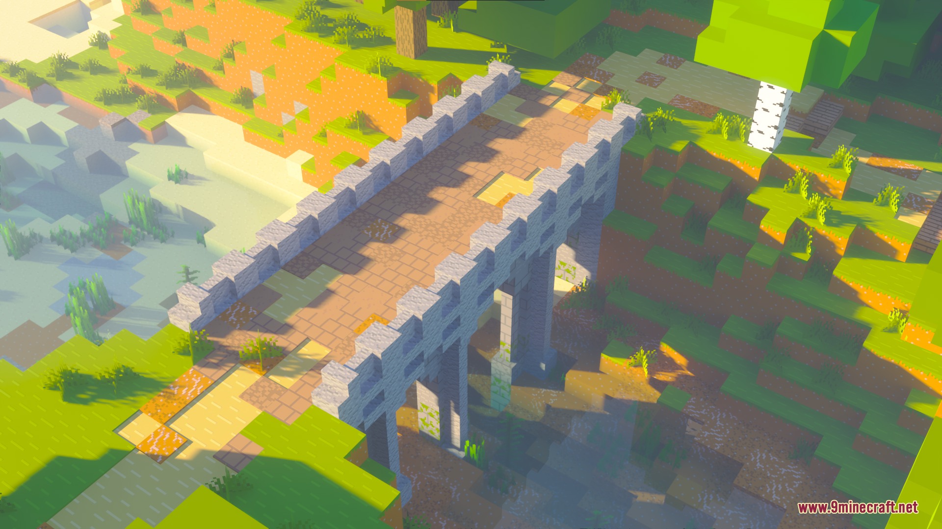 Bare Bones PBR X128 Resource Pack Screenshot 8 A stone bridge crossing a river in a bright and clean Minecraft world