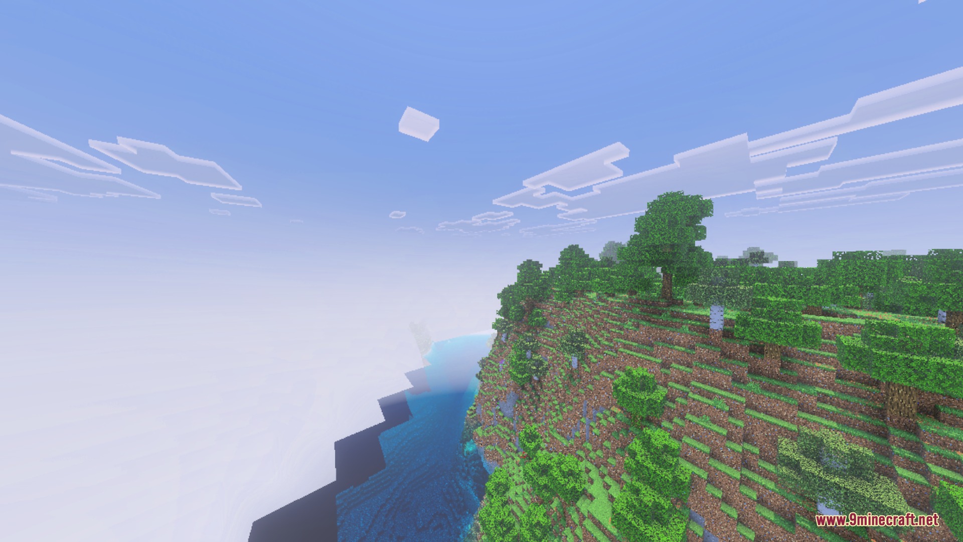 Bare Bones Simple PBR Bedrock Port Shader Screenshot 6 A lush green cliffside overlooking a vast blue ocean under a bright sky