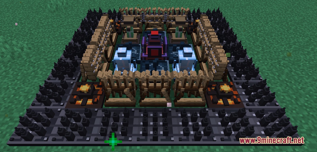 A base defense setup featuring a central core surrounded by spikes and fences