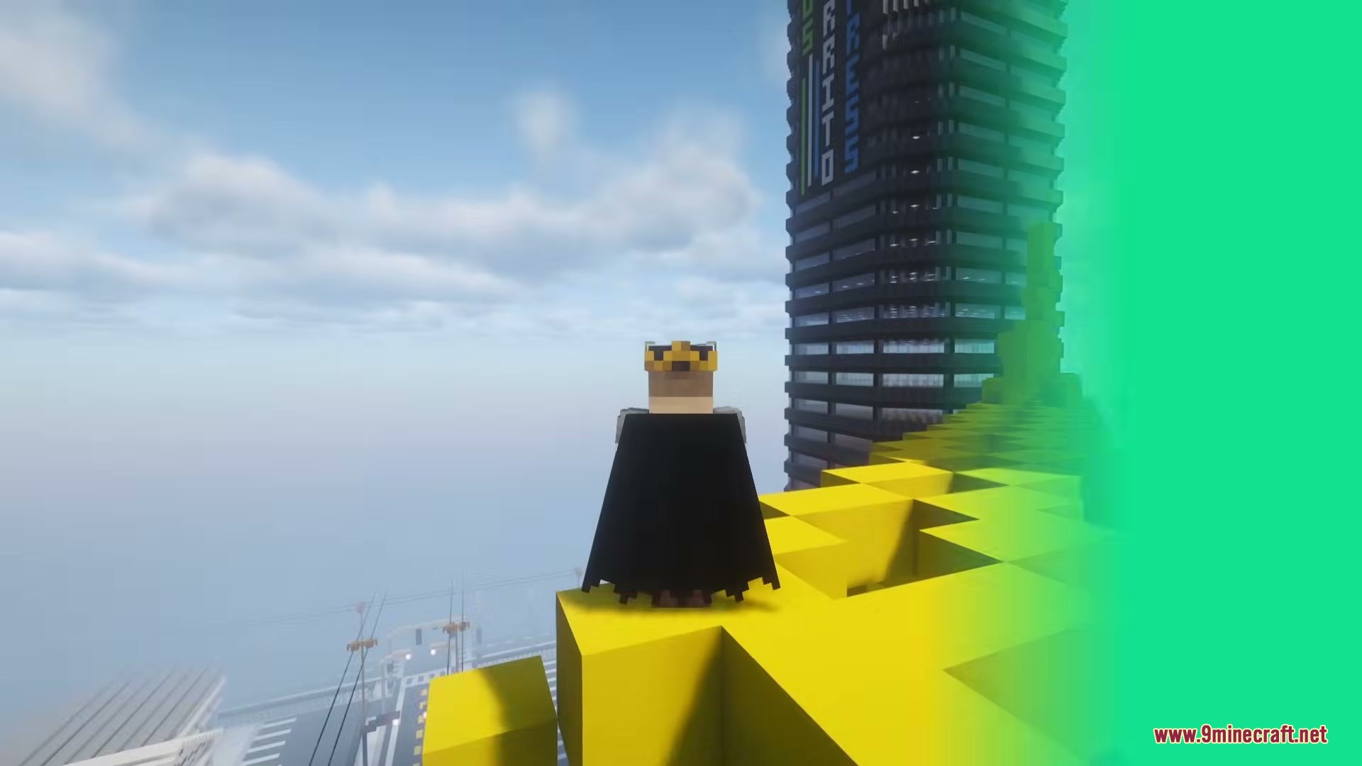 Minecraft character wearing a crown and black cape stands on a yellow ledge