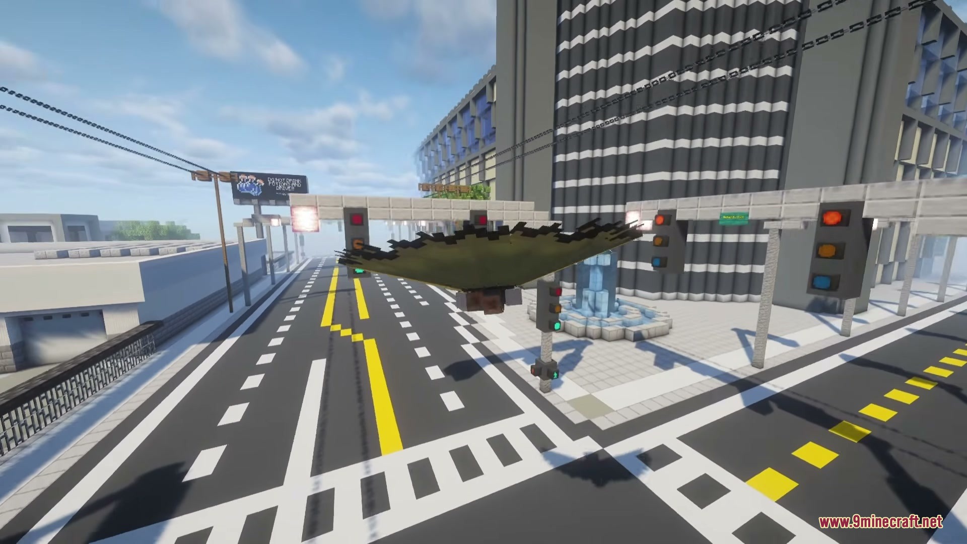 A Minecraft character glides through the air with a large black cape