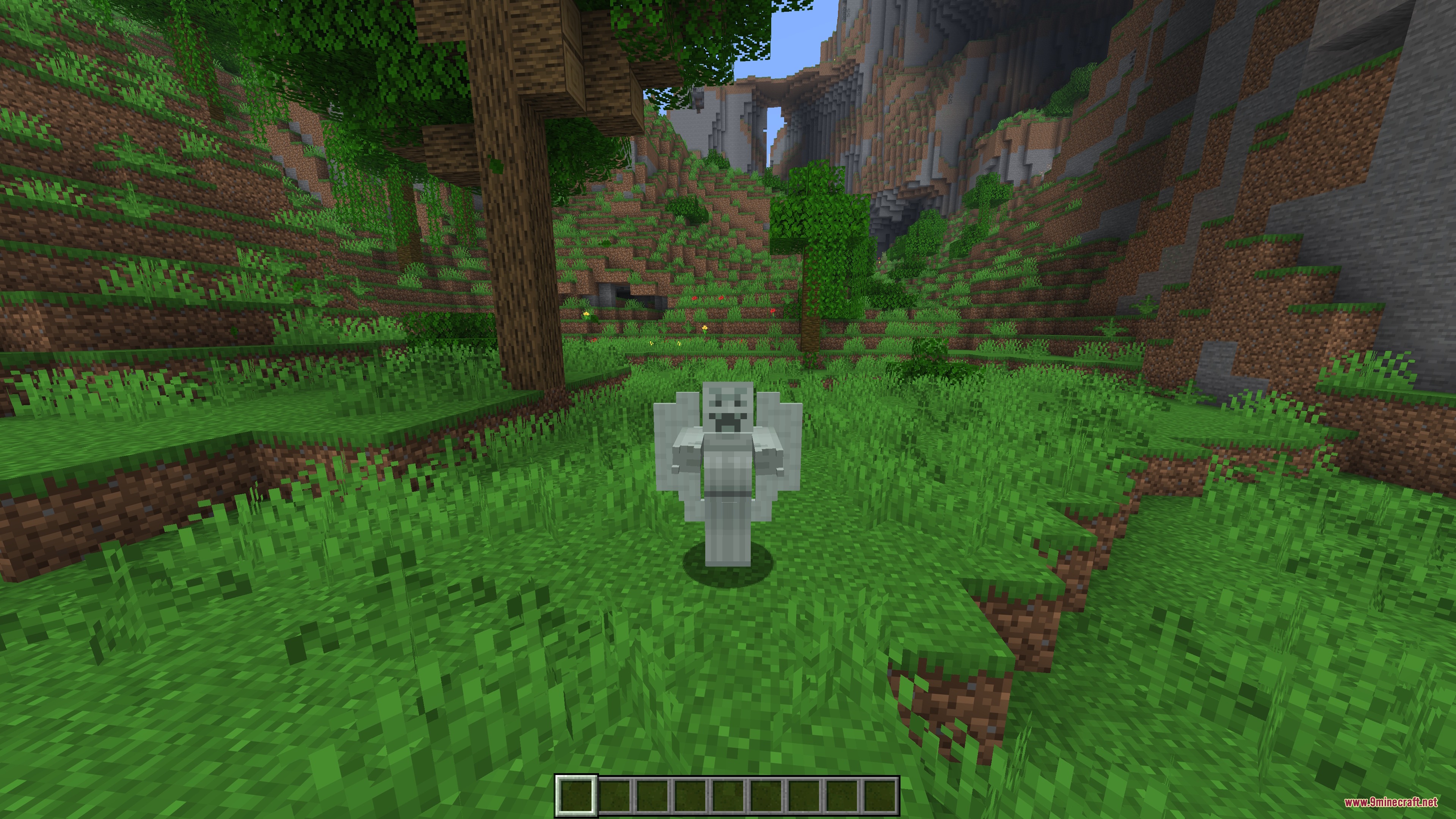 Bedrock Skins Mod Screenshot 5 A player character wearing a custom white angel creeper skin in a forest