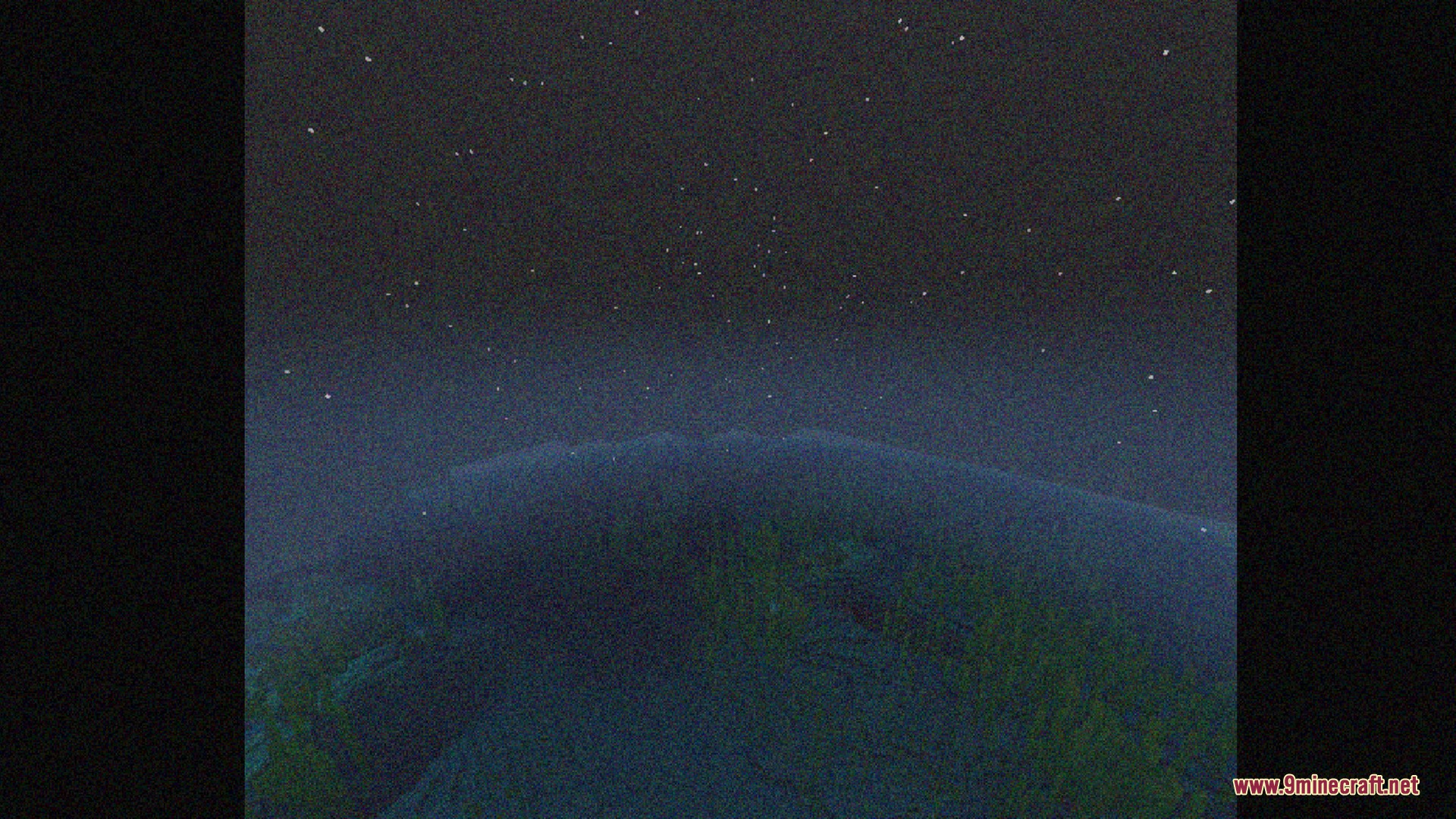 Starry night sky over a dark landscape with a vintage tape visual style