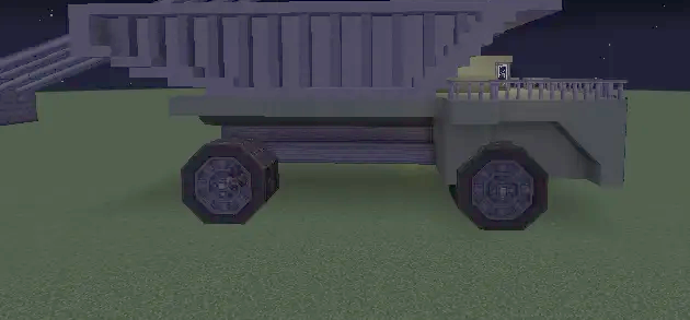 Belaz 7558 Schematic Screenshots 2 Side view of a massive mining dump truck build at night in Minecraft