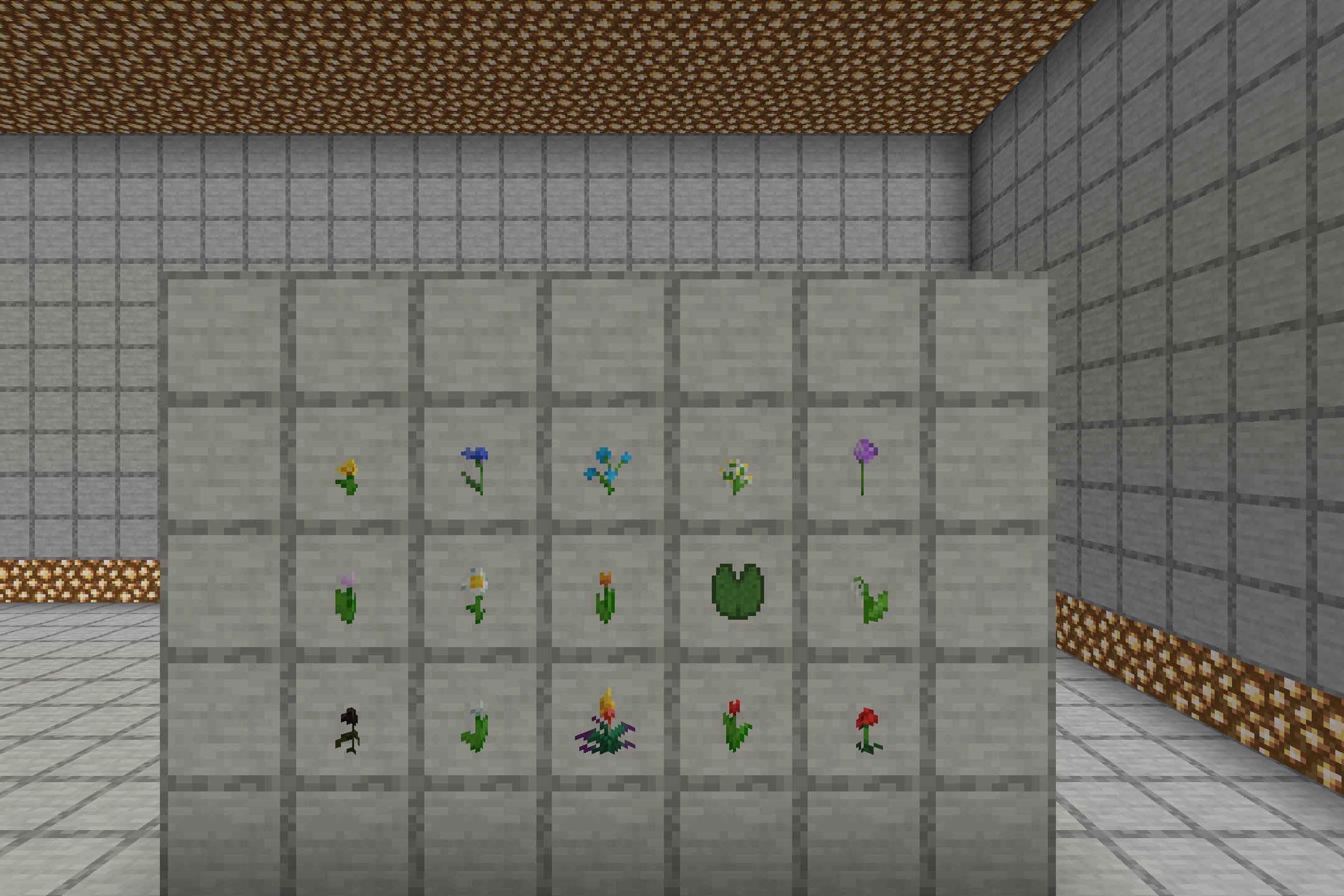 Various Minecraft flowers and a lily pad displayed as 3D models on a wall