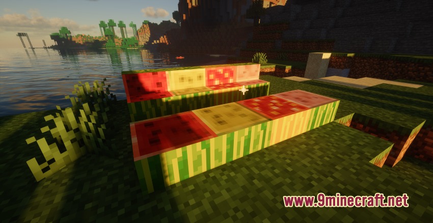 Better Melon Mod Screenshot 3 Colorful melon blocks placed on grass near a lake at sunset