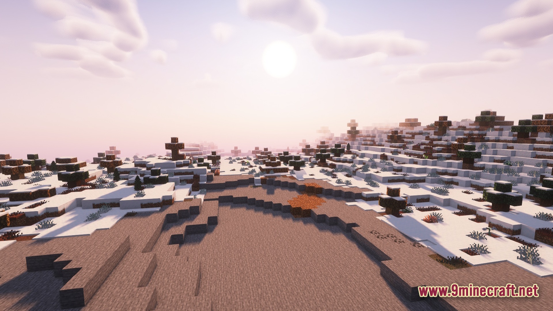 Biomes And Dungeons BAD RPG & Magic Modpack Screenshot 7 A vast snowy tundra landscape with scattered trees and shrubs under a bright morning sun