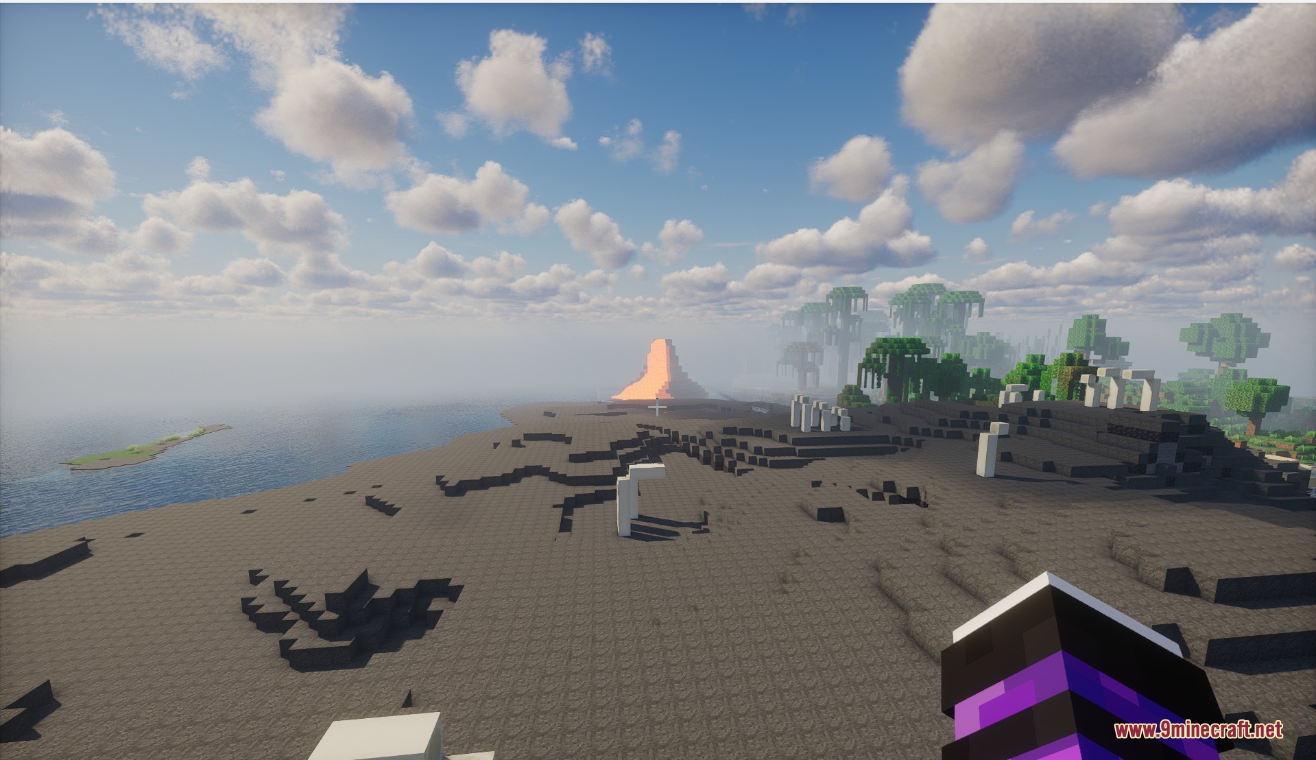 Biomes of Overworld Mod Screenshot 4 A desolate volcanic landscape with dark terrain and white fossil structures near a volcano