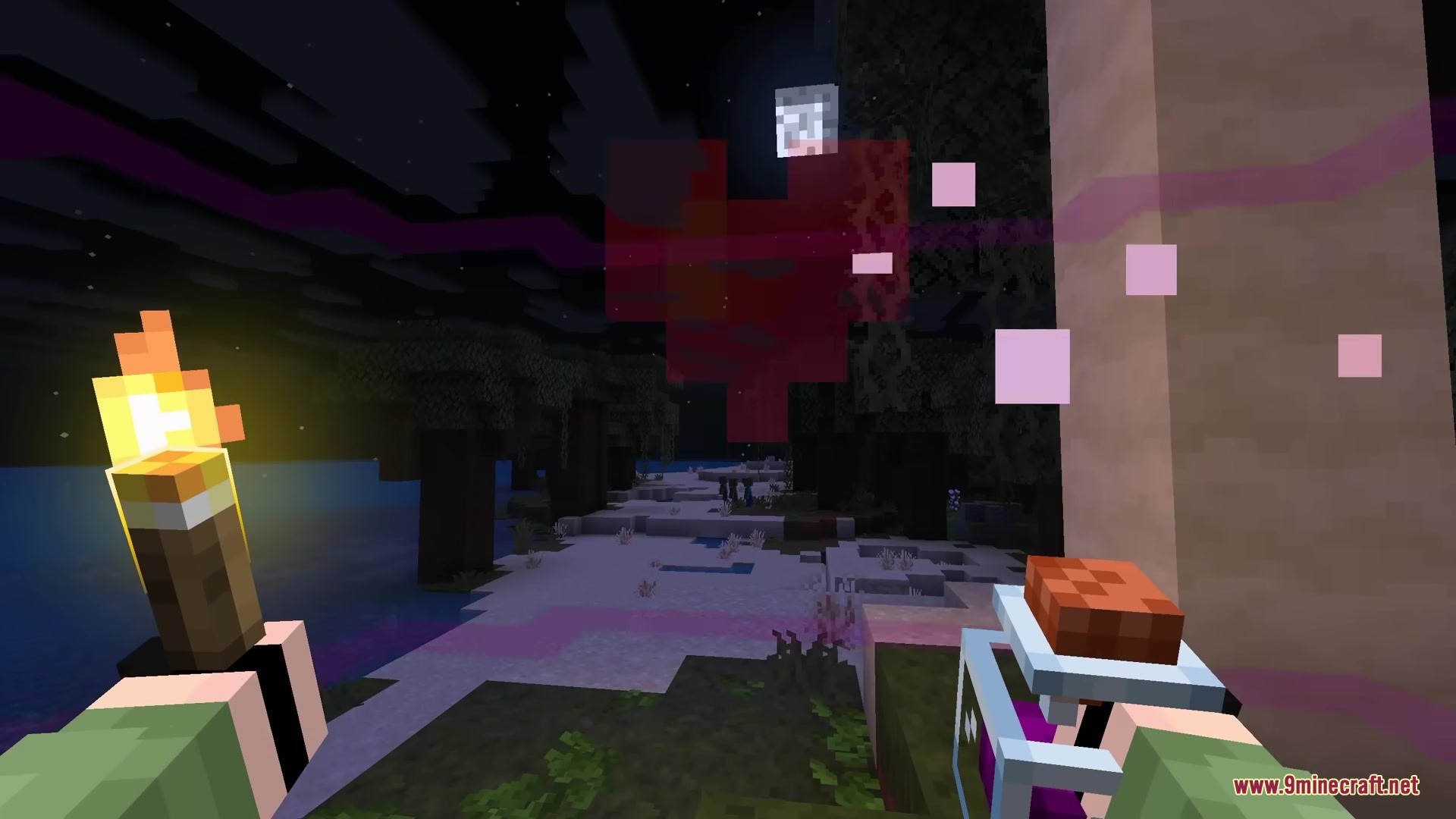 Bits and Balance Mod Screenshot 5 A player holding a torch and potion at night with heart effects
