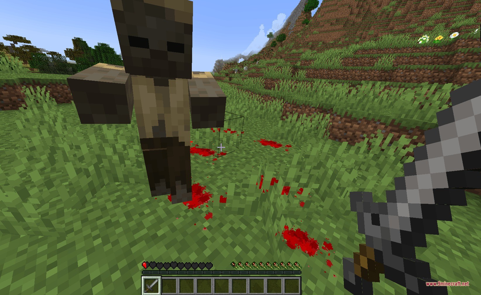 Blood N' Particles Data Pack Screenshot 2 Player attacking a mob with a sword creating red blood particles on grass