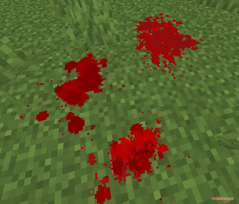 Blood N' Particles Data Pack Screenshot 3 Red blood splatters on green grass blocks in Minecraft