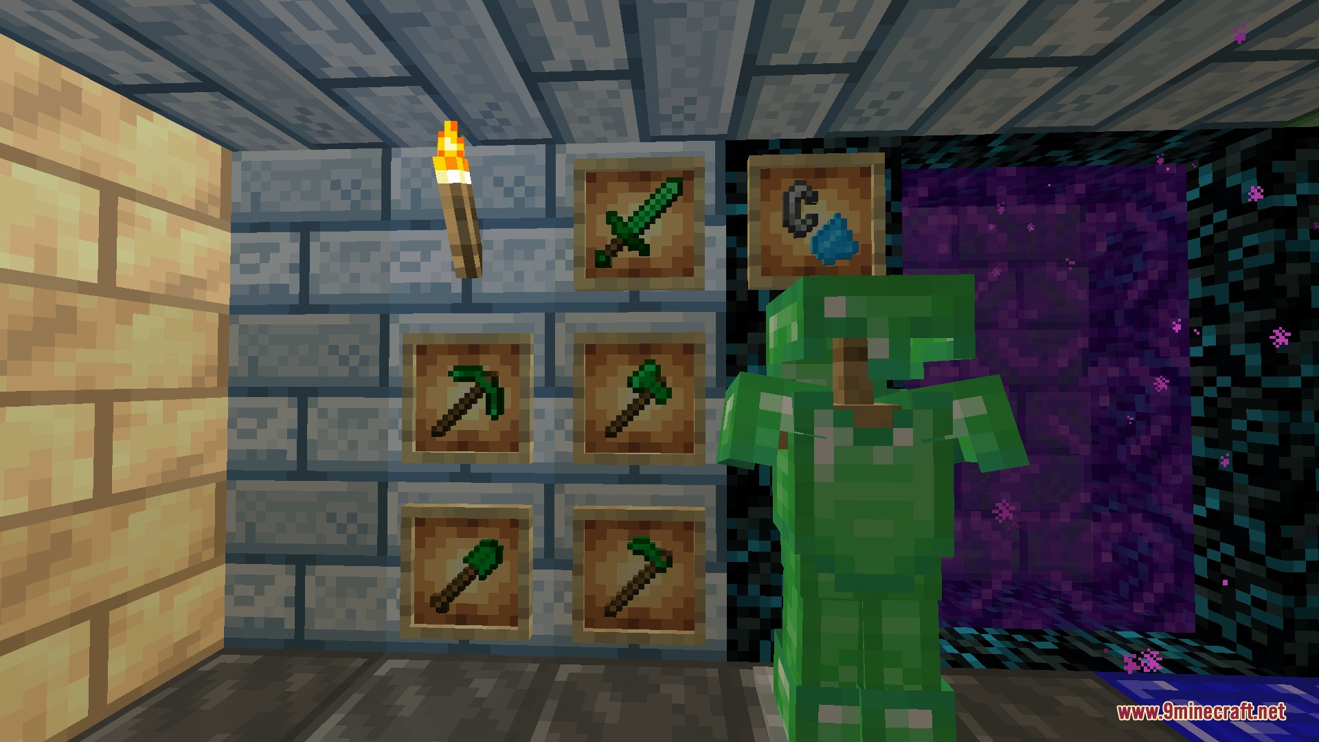 Emerald armor and tools displayed on item frames next to a portal