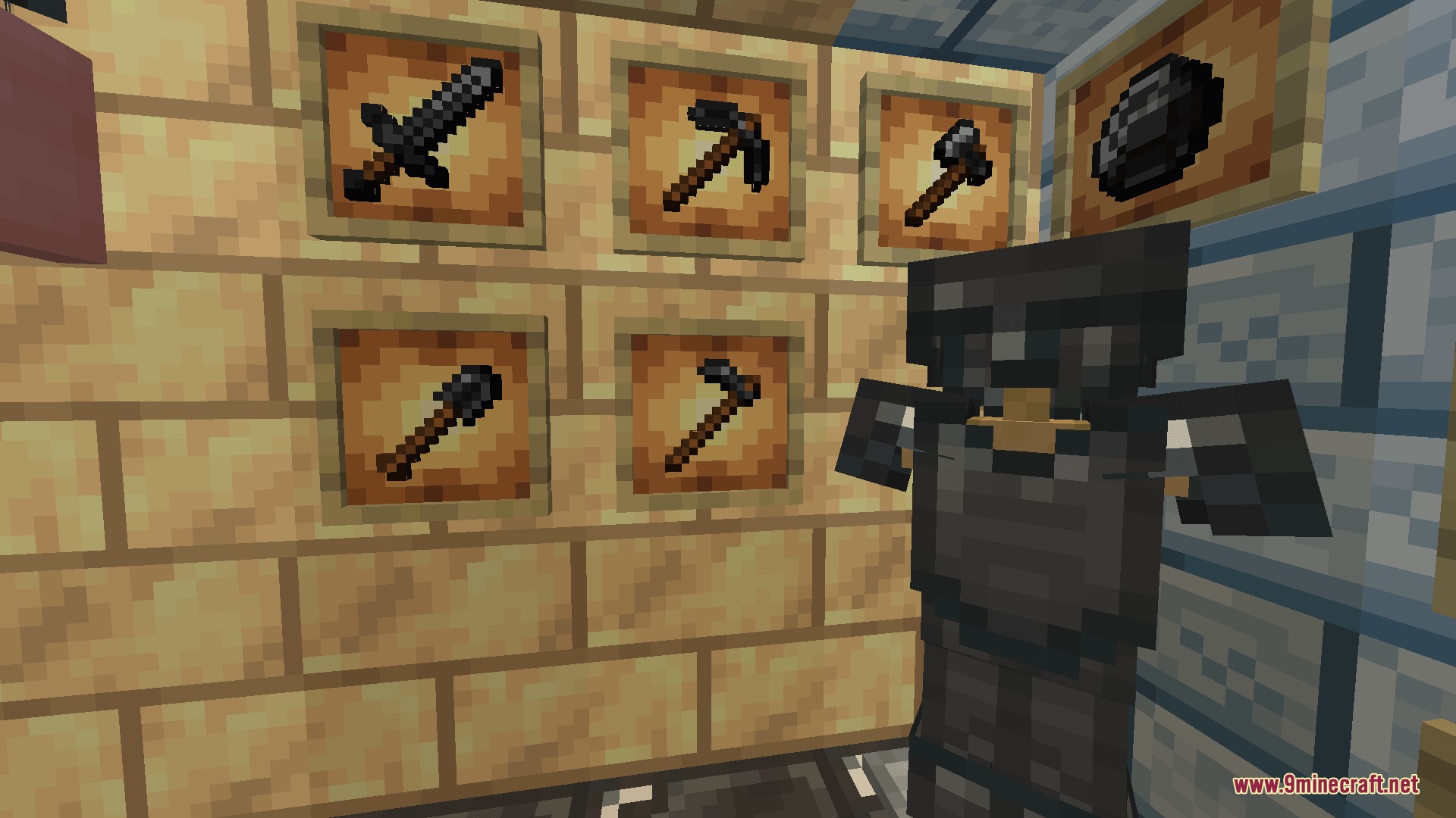 Onyx armor and tools displayed on item frames and an armor stand