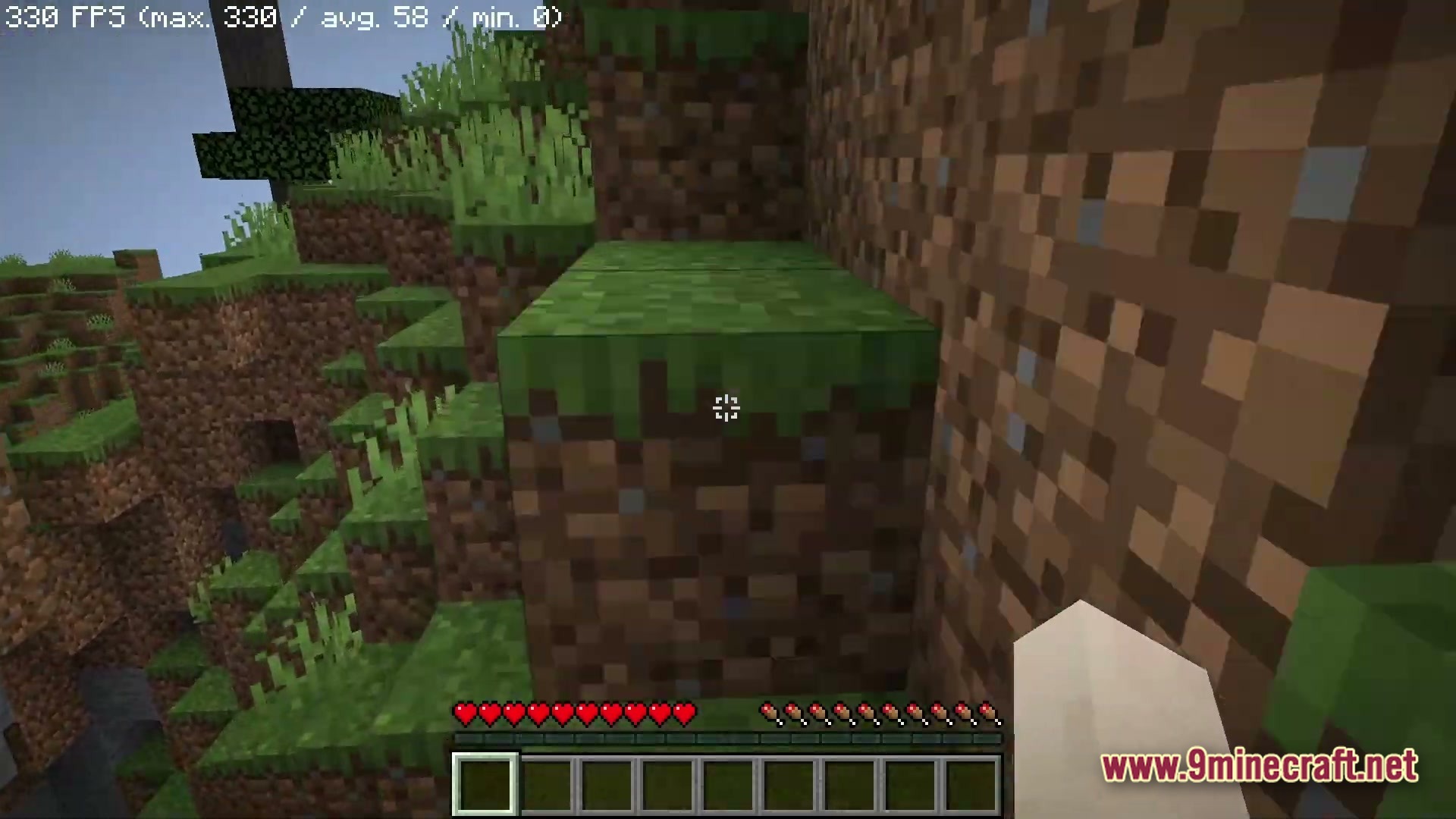Boosted FPS Performance Optimized Modpack Screenshot 4 A first-person view of a grassy hillside with an active frames per second counter overlay