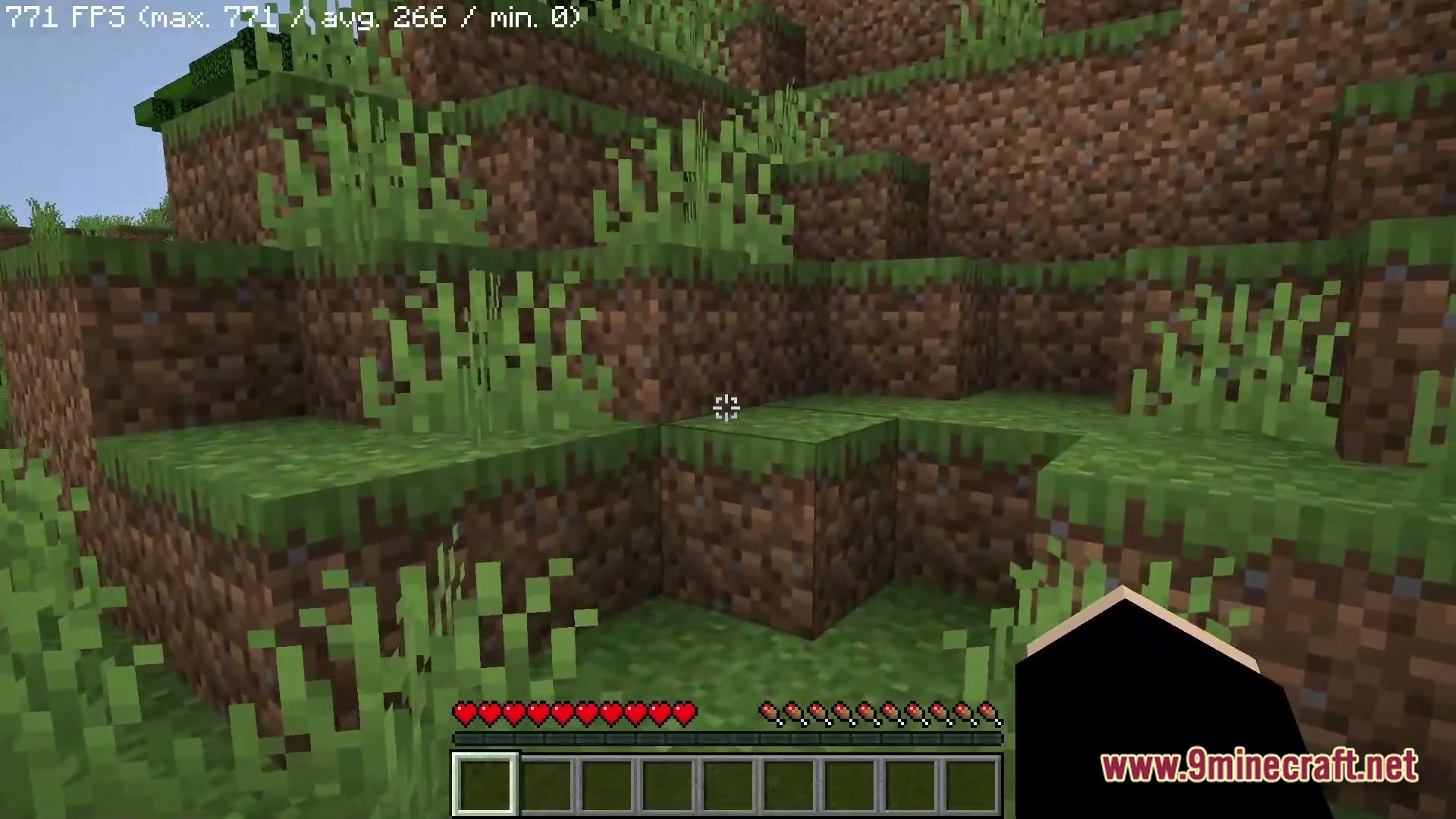 Boosted FPS Performance Optimized Modpack Screenshot 6 A first-person view of a grassy hillside in Minecraft with a high frame rate counter displayed