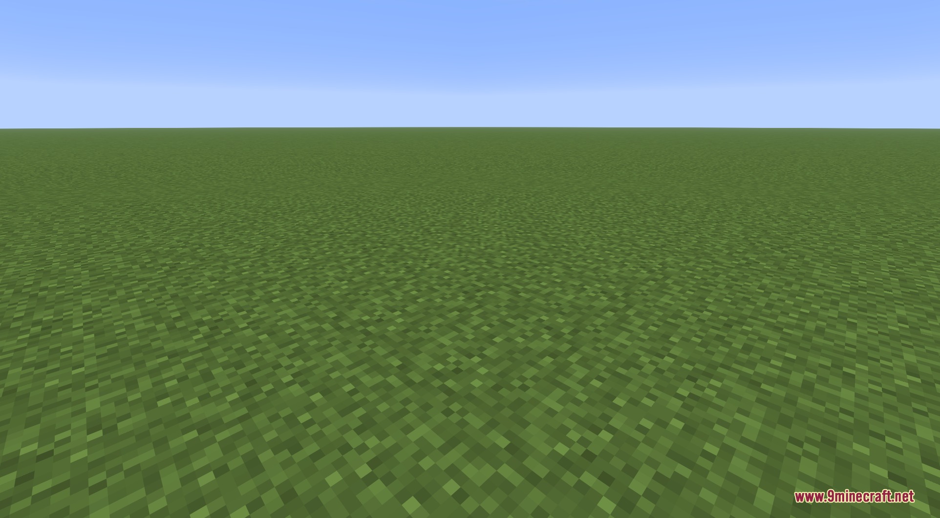 A wide green grass field under a clear blue sky in Minecraft