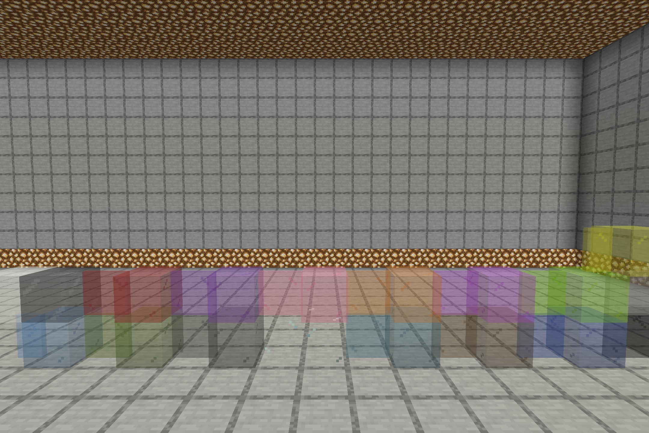 BorderlessGlass Resource Pack Screenshot 1 A row of colored stained glass blocks without borders in a stone room