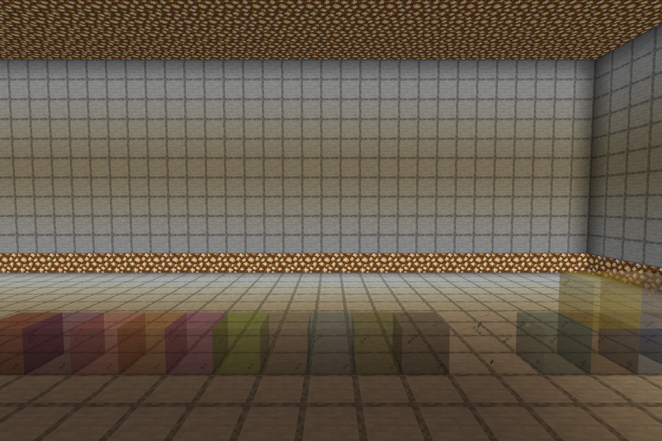 Various colored stained glass blocks without borders displayed in a large room