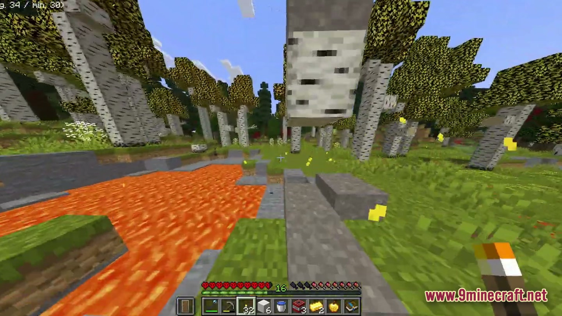 Boundless Tale Odyssey Modpack Screenshot 4 A player holds a torch near a lava pool within a dense birch forest biome