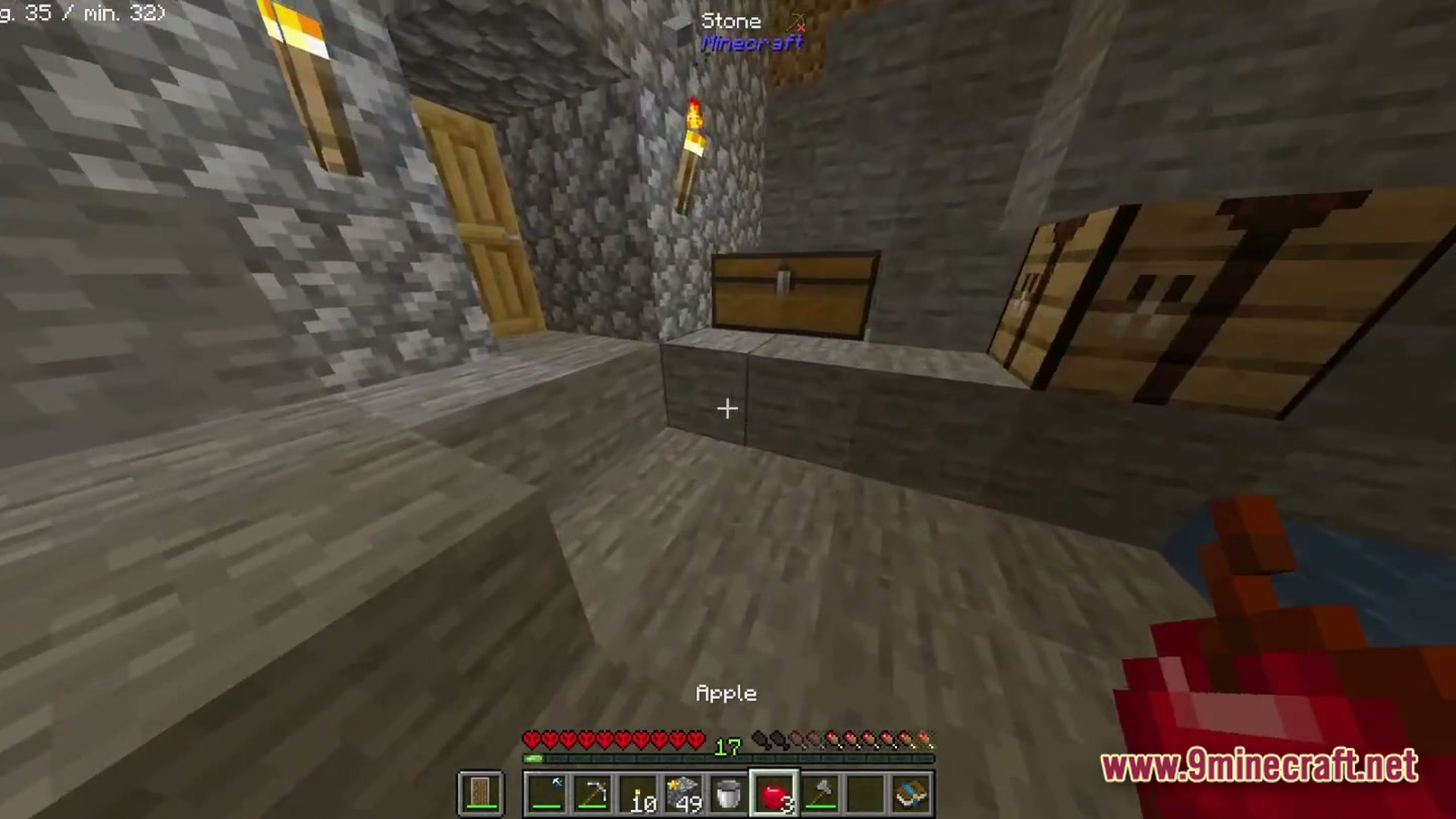Boundless Tale Odyssey Modpack Screenshot 5 A player stands in a stone underground base featuring a chest, torches, and crafting tables