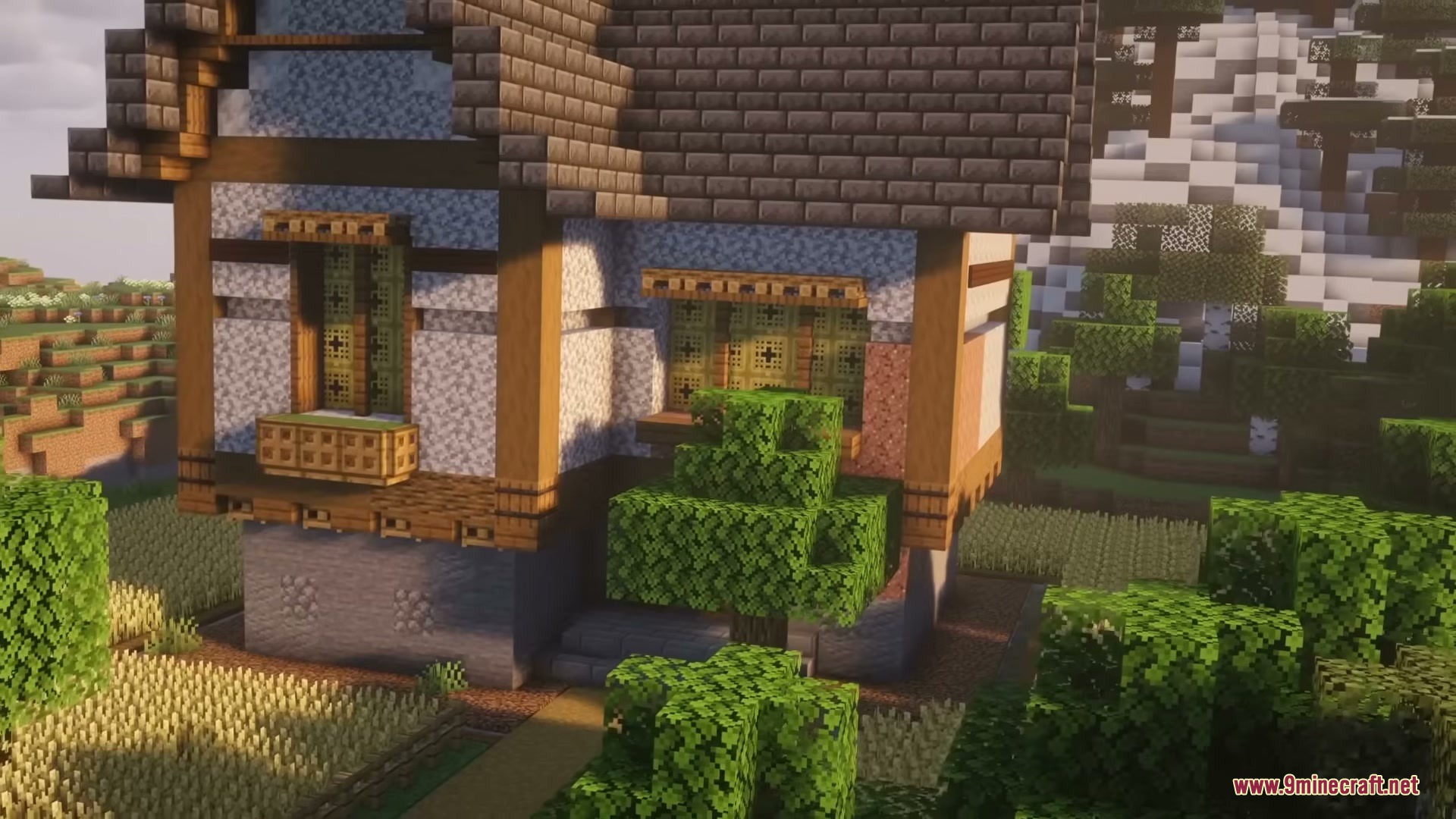 Brave Structures Mod Screenshot 3 A small medieval house with a stone base and a wheat farm