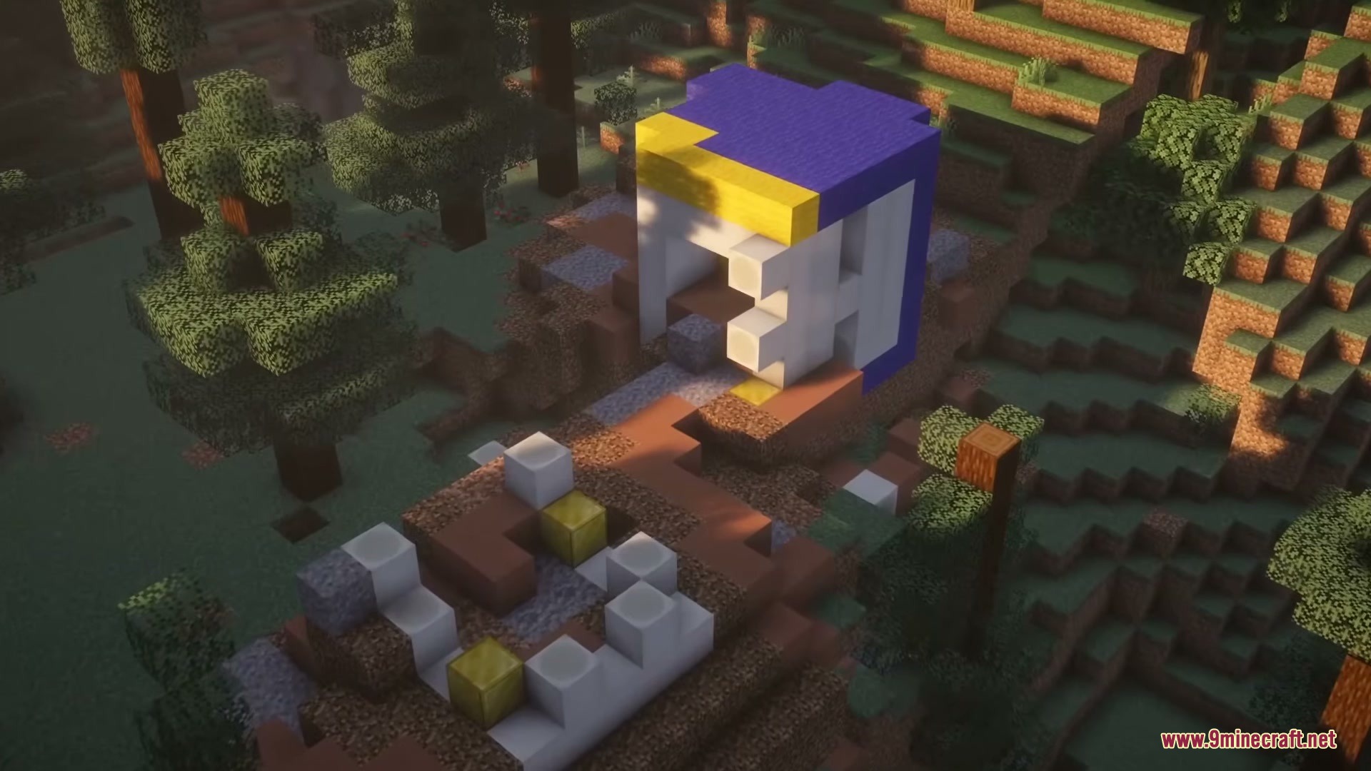 Brave Structures Mod Screenshot 8 A small colorful structure made of blocks in a dense forest biome