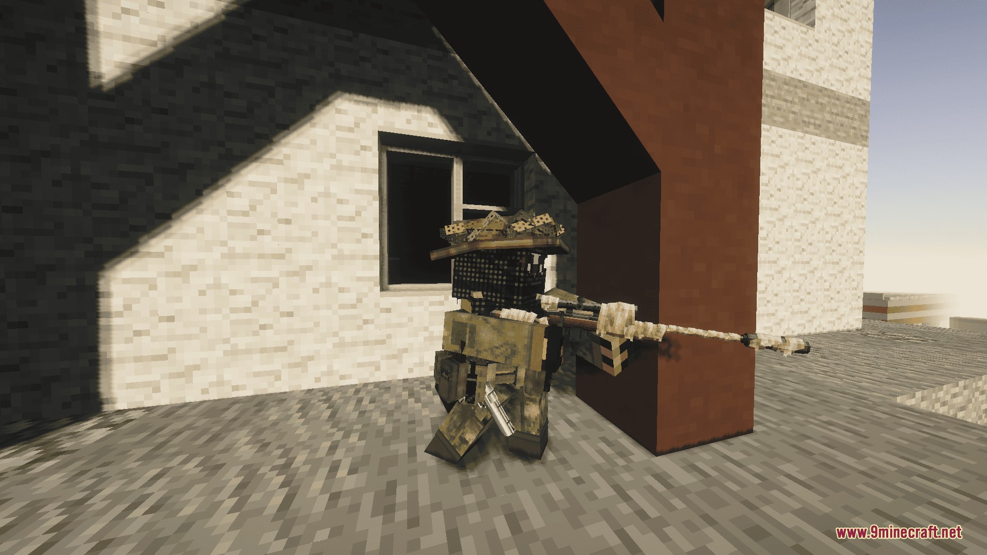 CAPS Awim TACTICAL GEAR Mod Screenshot 2 A player in desert camouflage gear aims a sniper rifle from behind a wall
