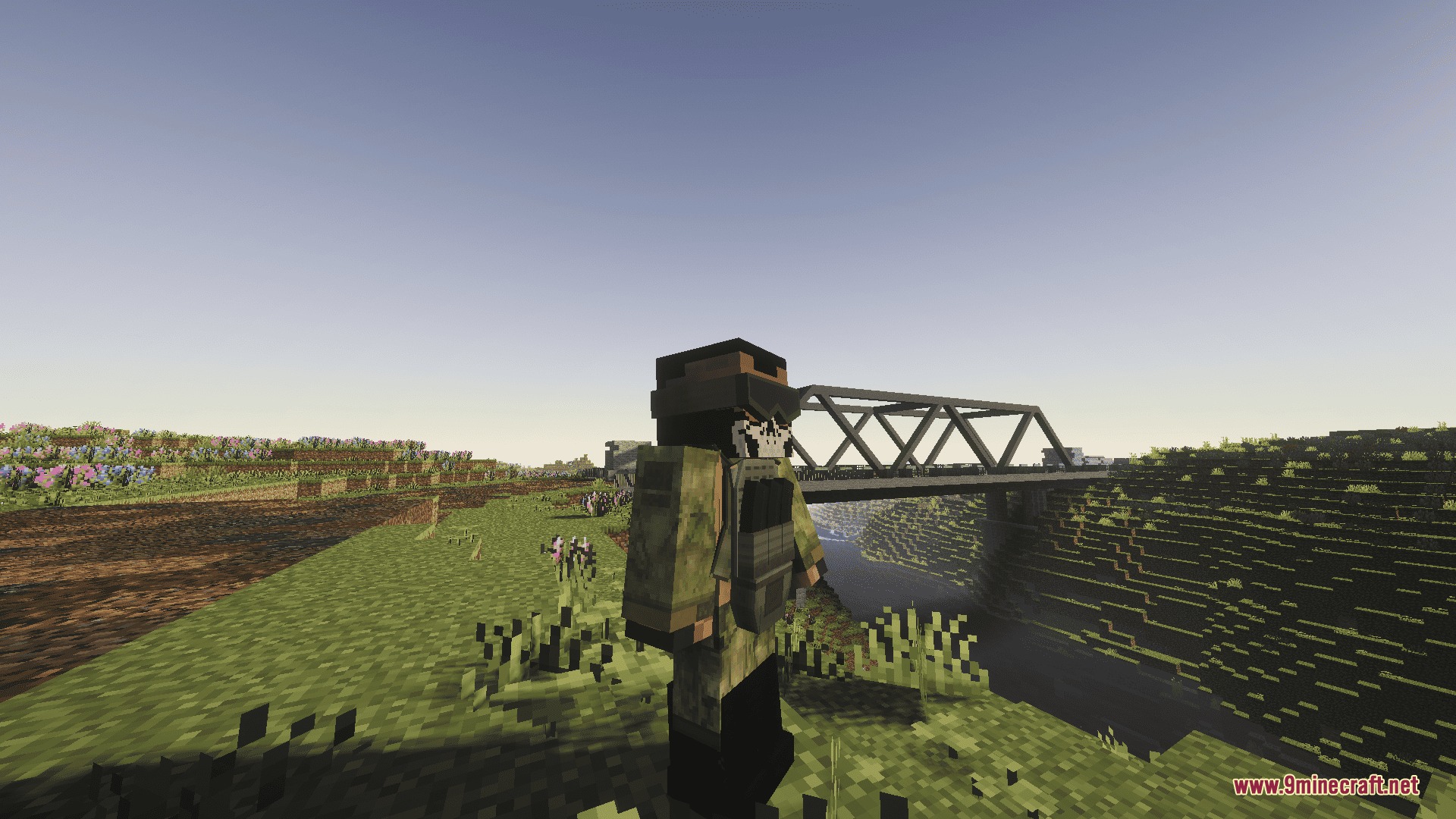 CAPS Awim TACTICAL GEAR Mod Screenshot 3 Minecraft character wearing camouflage armor and a skull mask standing near a bridge