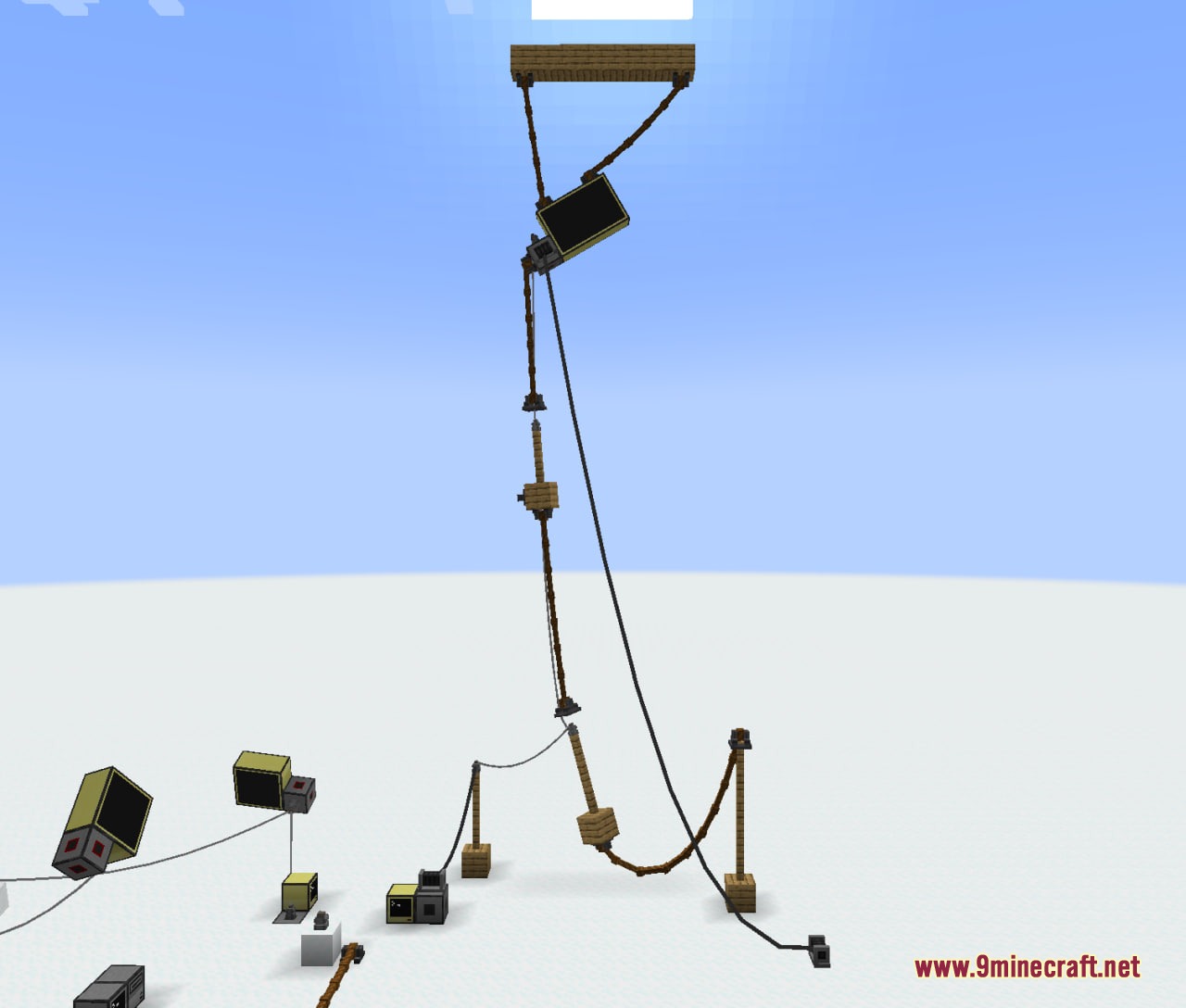 Huge net cable connectors linking computer monitors across a tall vertical structure