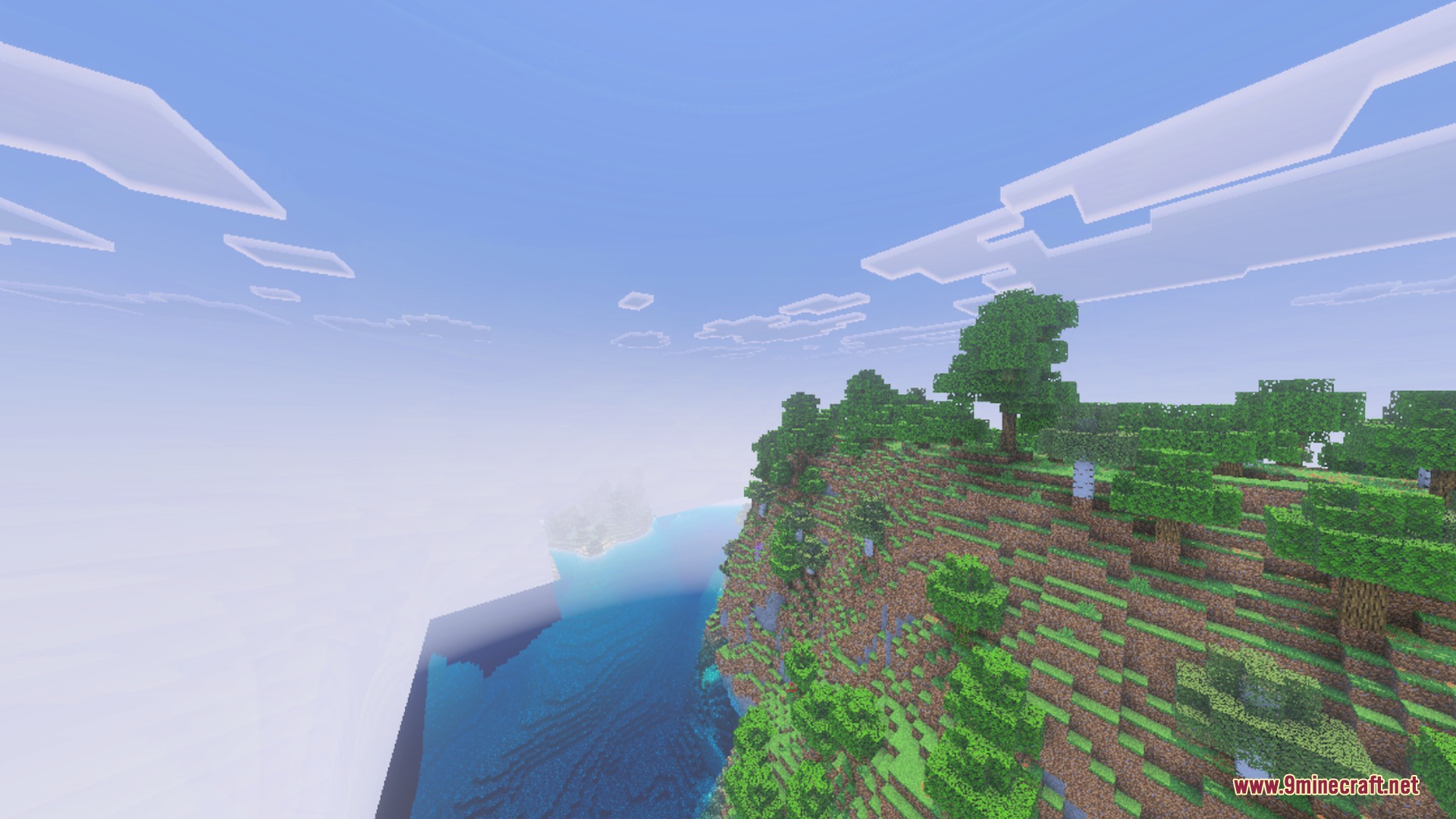 CLEAR FOG VISUAL Shader Screenshot 1 A high angle view of a grassy cliff overlooking the vast blue ocean