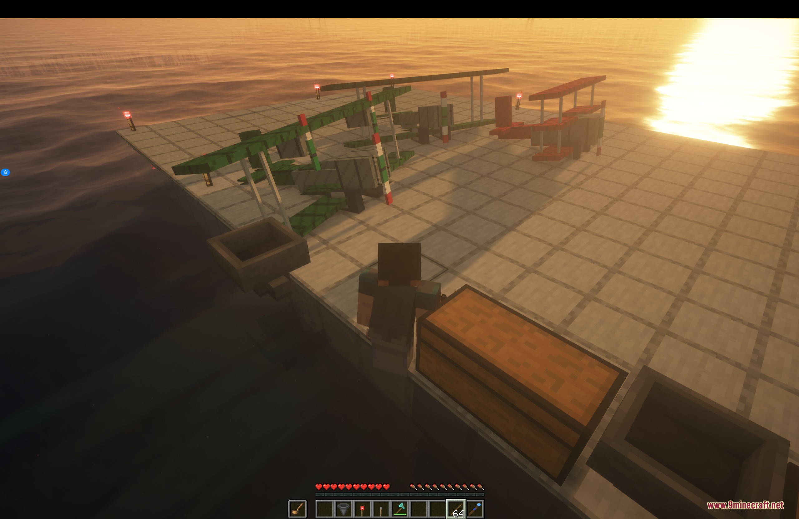 Canvas Skybolt Mod Screenshot 2 Multiple vintage aircraft parked on a platform over the water at sunset