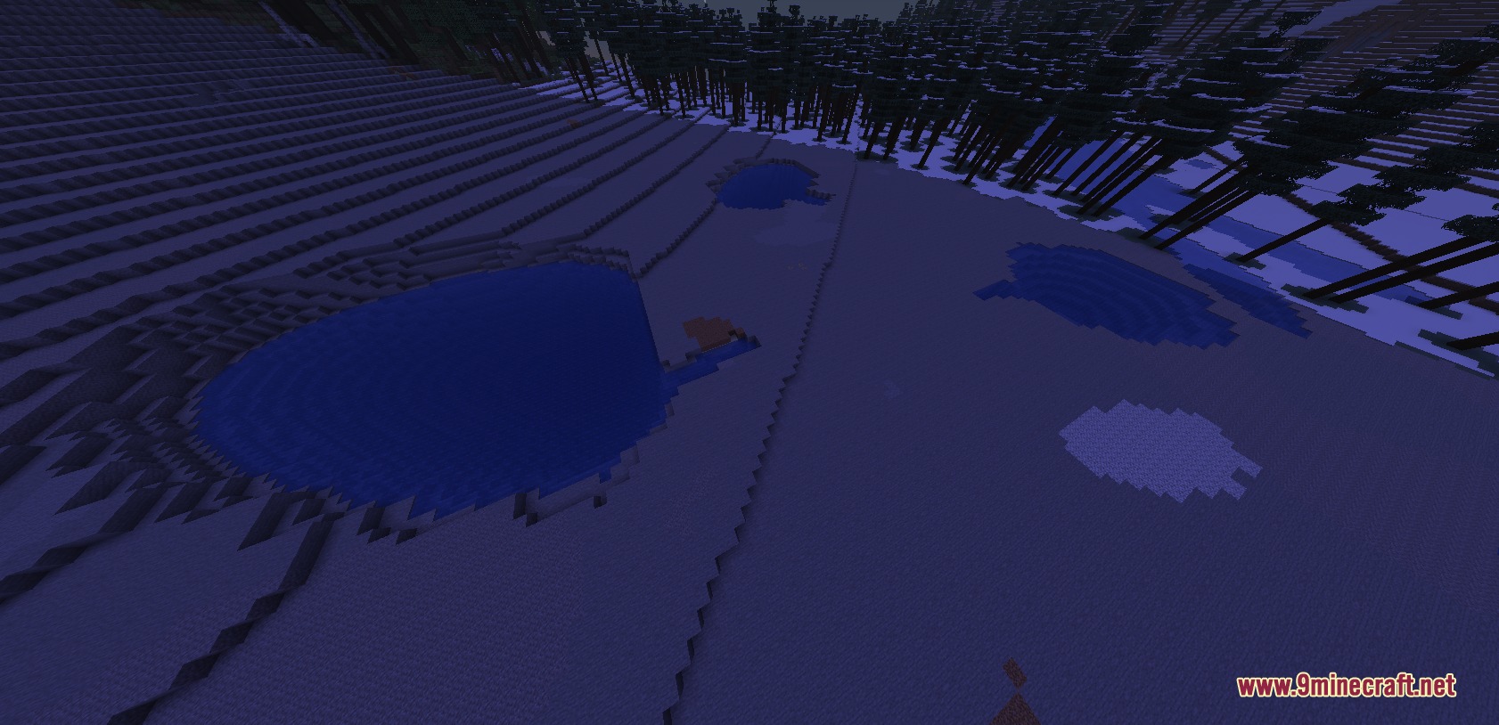 Canyons and Cliffs and Biomes Mod Screenshot 4 Expansive snowy landscape with frozen water pools under the night sky