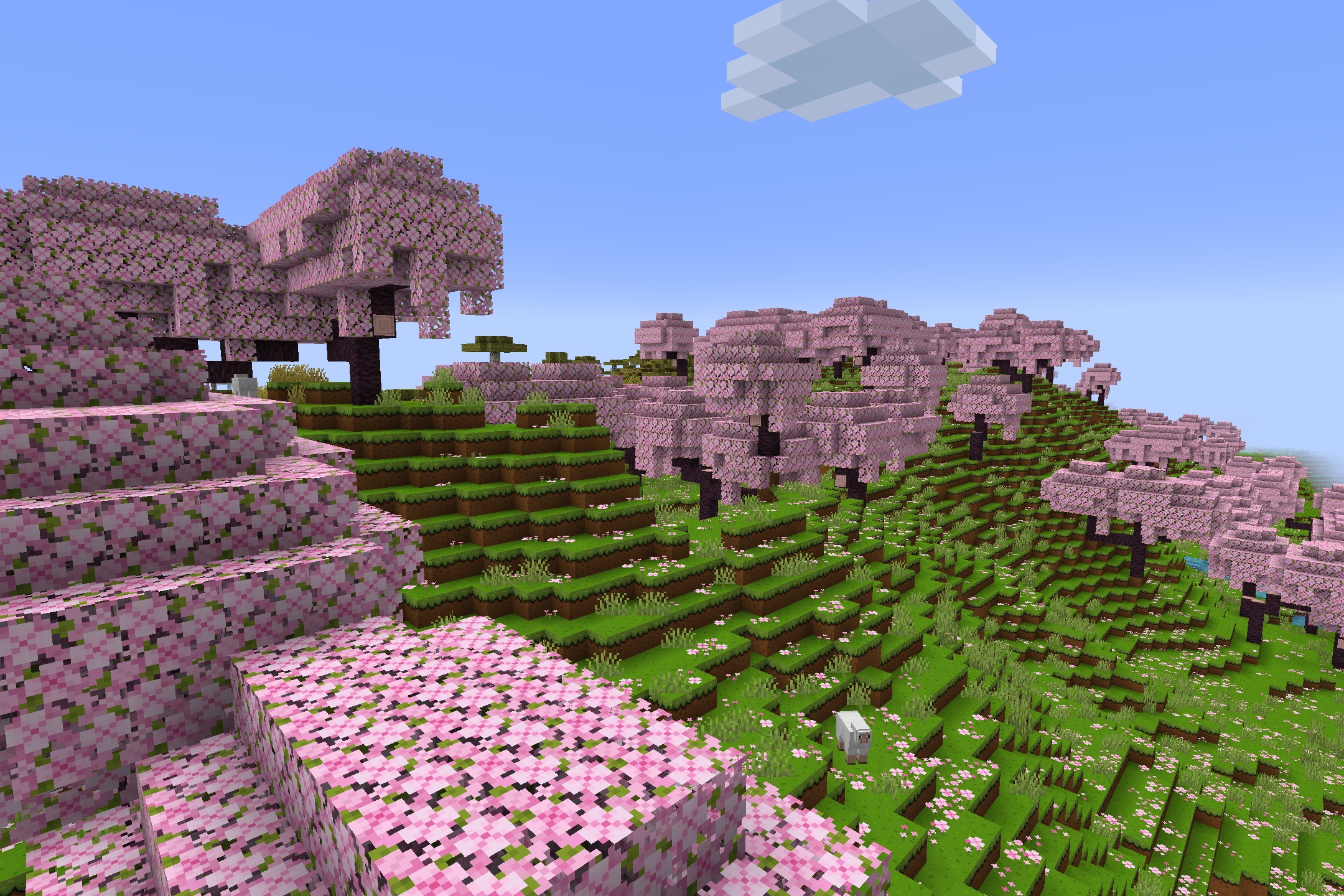 CartoonCraft Resource Pack Screenshot 1 Bright pink cherry blossom trees covering a lush green hill in cartoon style