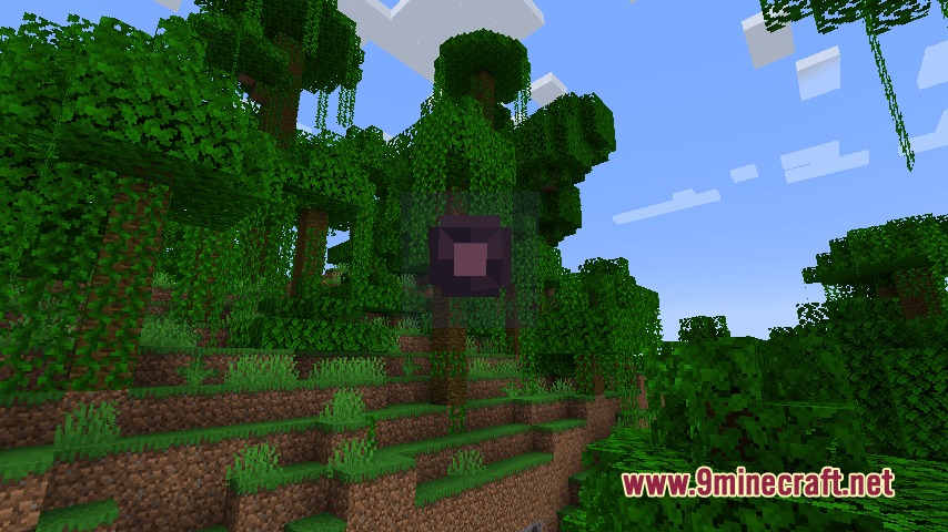 Celestial Spark Core Mod Screenshot 1 A floating Specter Core hovers among the trees in a jungle