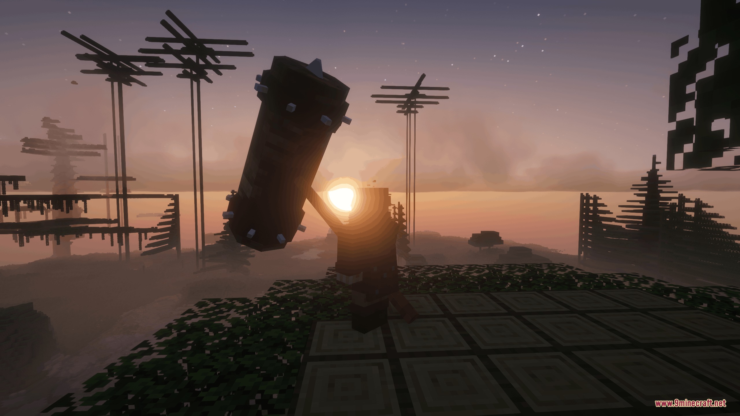 Chaos Persists Ore Spawn Remake Mod Screenshot 4 Minecraft player wielding a giant hammer weapon during a beautiful sunset