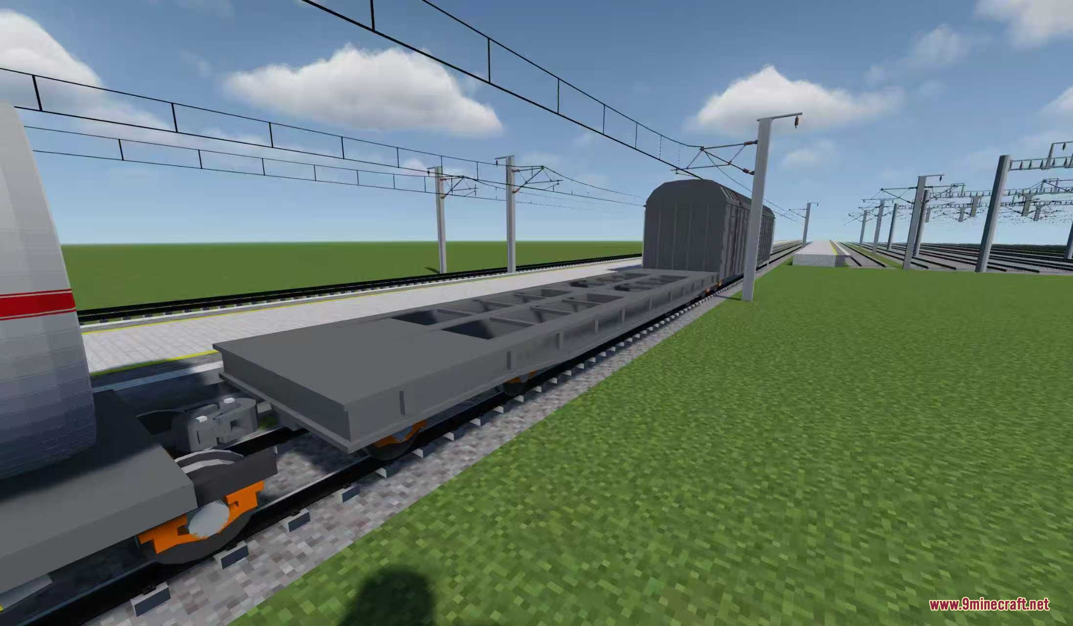 Chen Dian Metro Way Resource Pack Screenshot 6 A grey flatbed cargo train car positioned on a long railway track