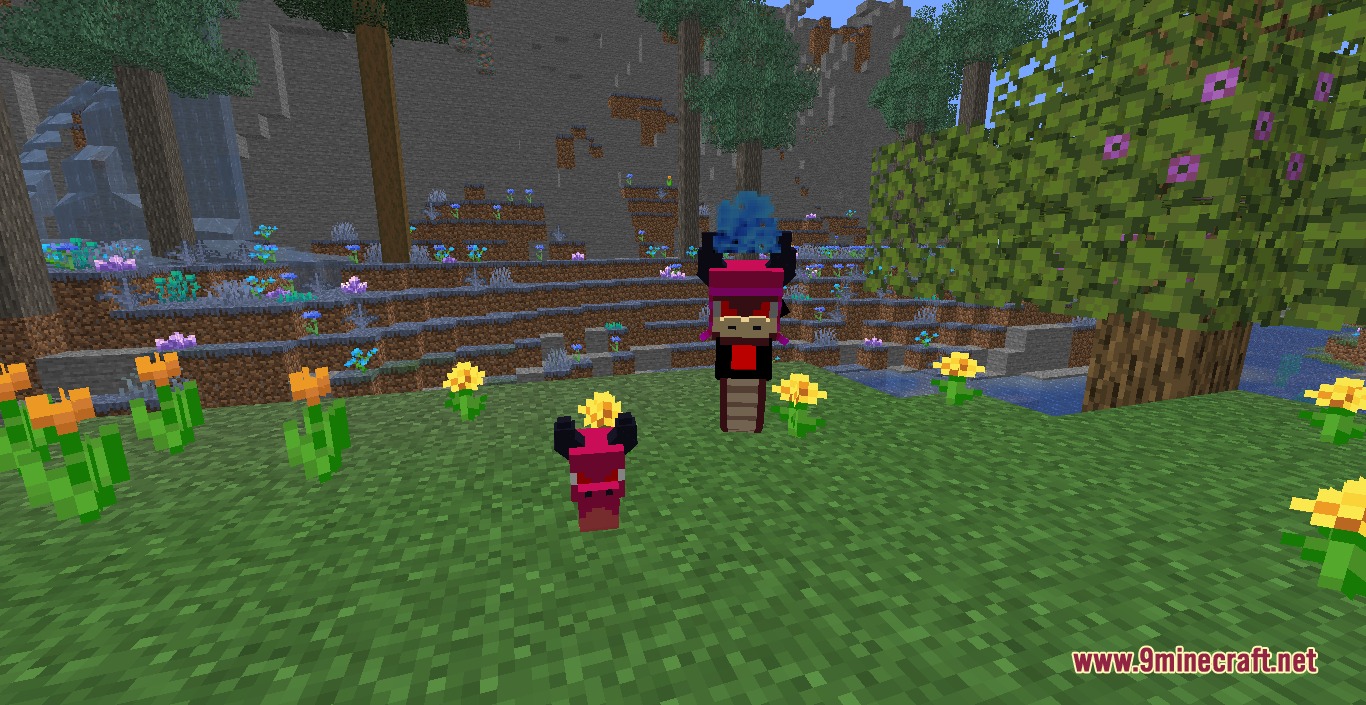 Chibi South Critters Mod Screenshot 4 Two pink ghostly snake creatures from the Ghissel line in a grassy field