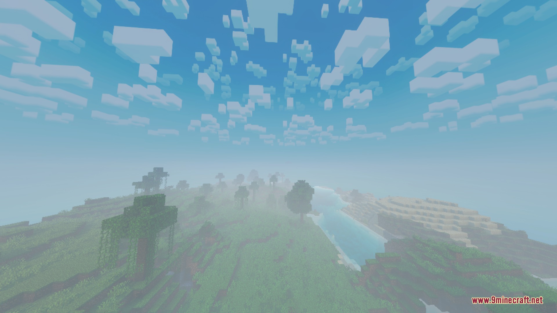 A scenic Minecraft landscape featuring realistic fog over green hills and water