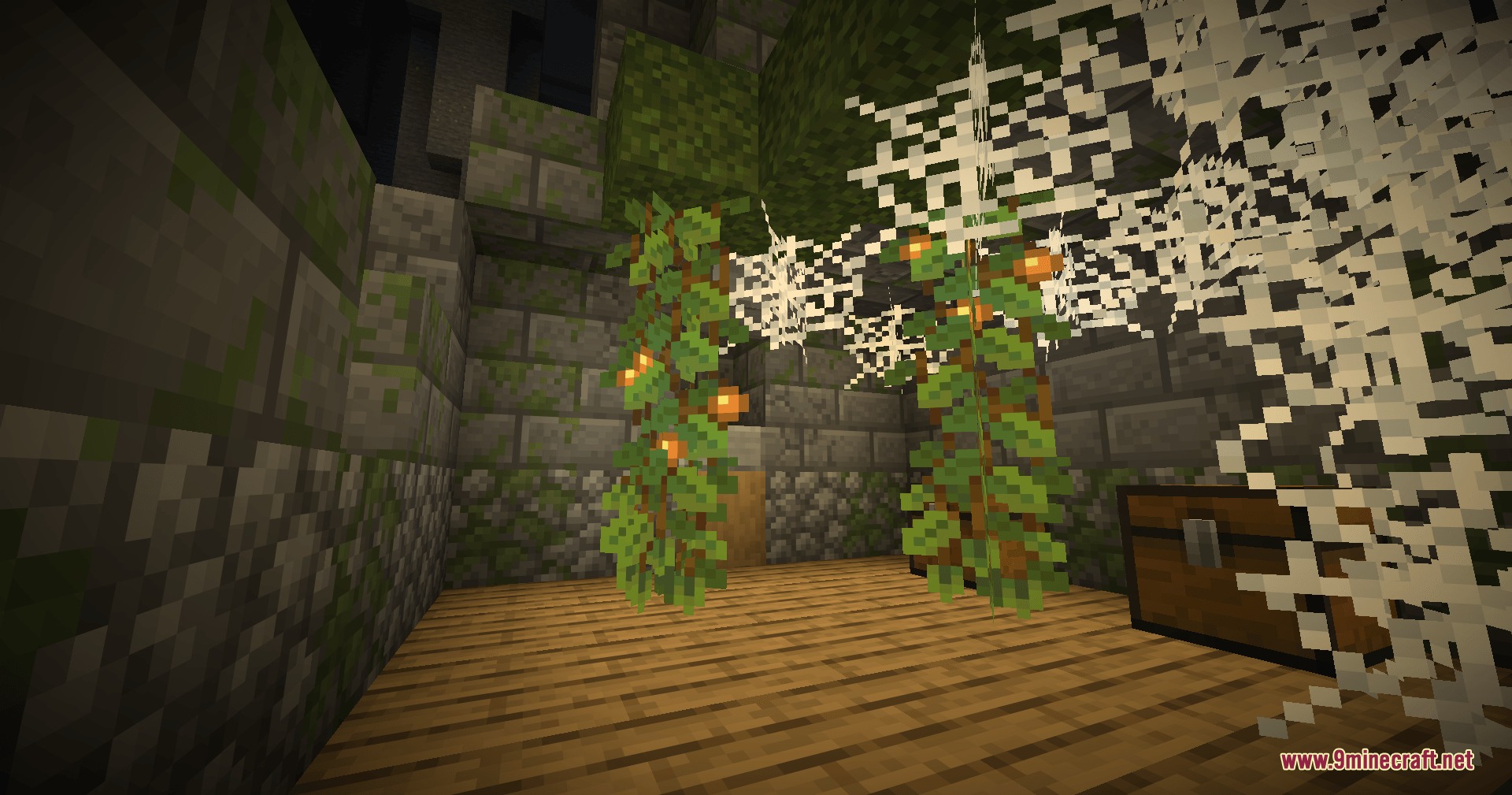 Cinch's Lost Mob Grinders Mod Screenshot 7 A ruined mob spawner room with cobwebs glow berries and a chest