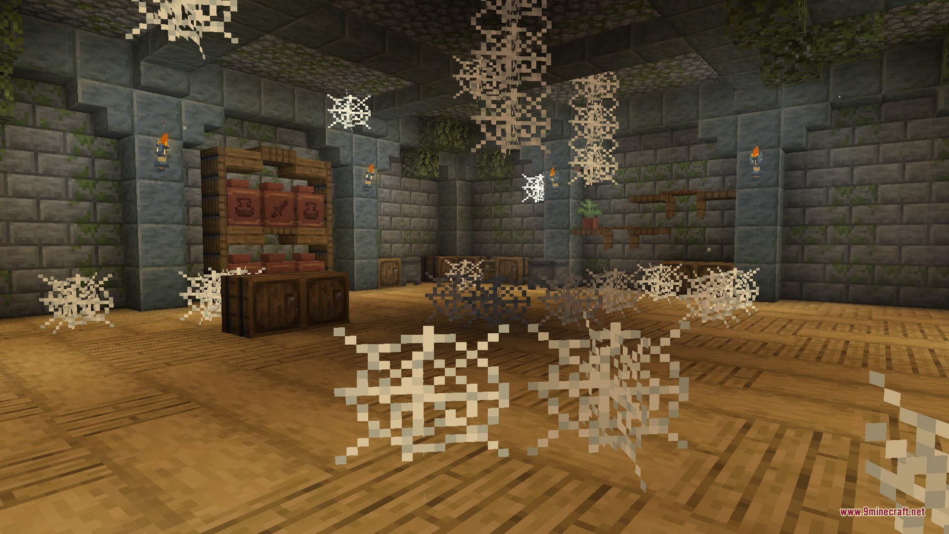 Citadel of Trials Data Pack Screenshot 9 Abandoned stone room with cobwebs and wooden storage containers in a stronghold