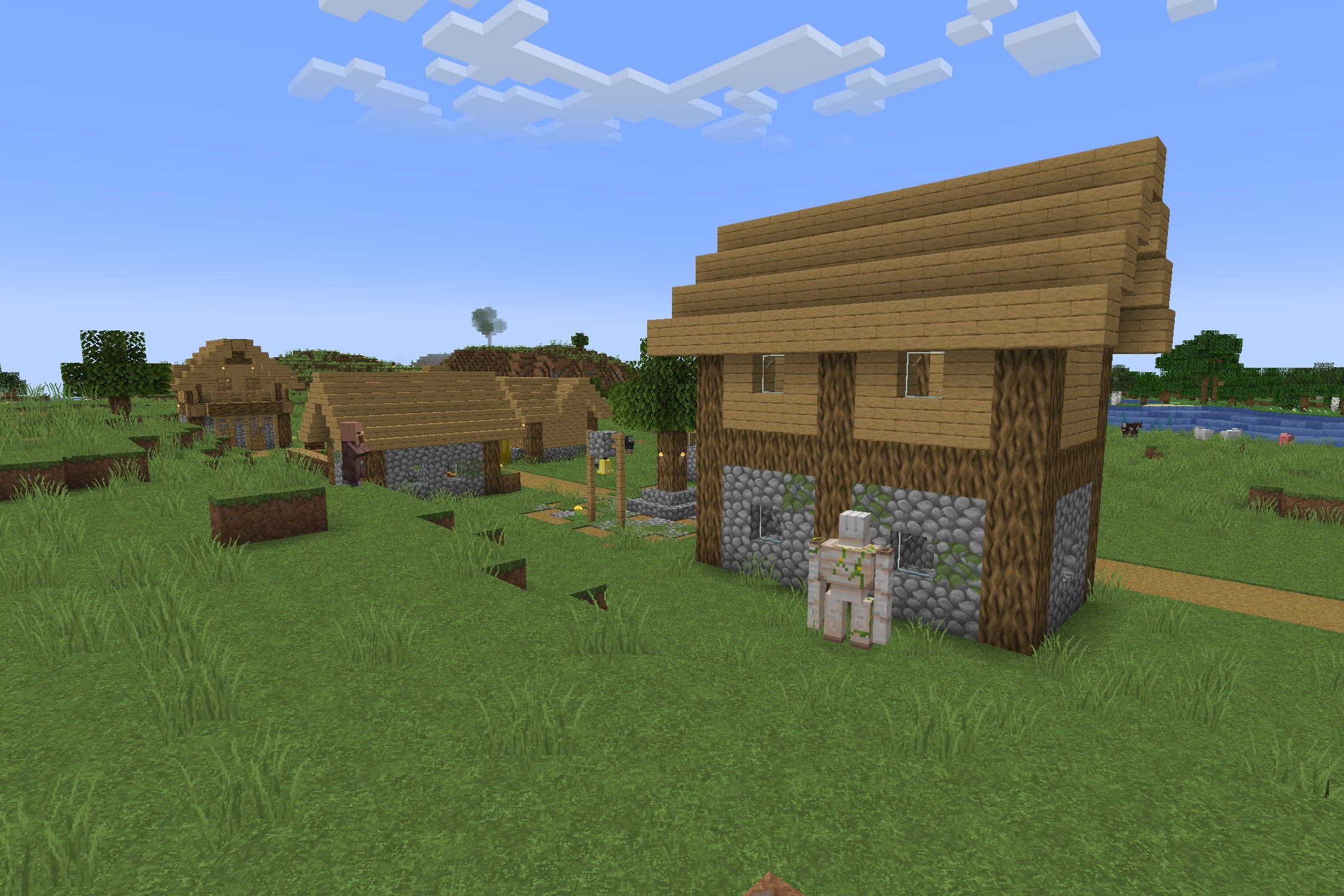 Classic Faithful 64x Jappa Resource Pack Screenshot 3 An iron golem stands near a village house with high resolution block textures