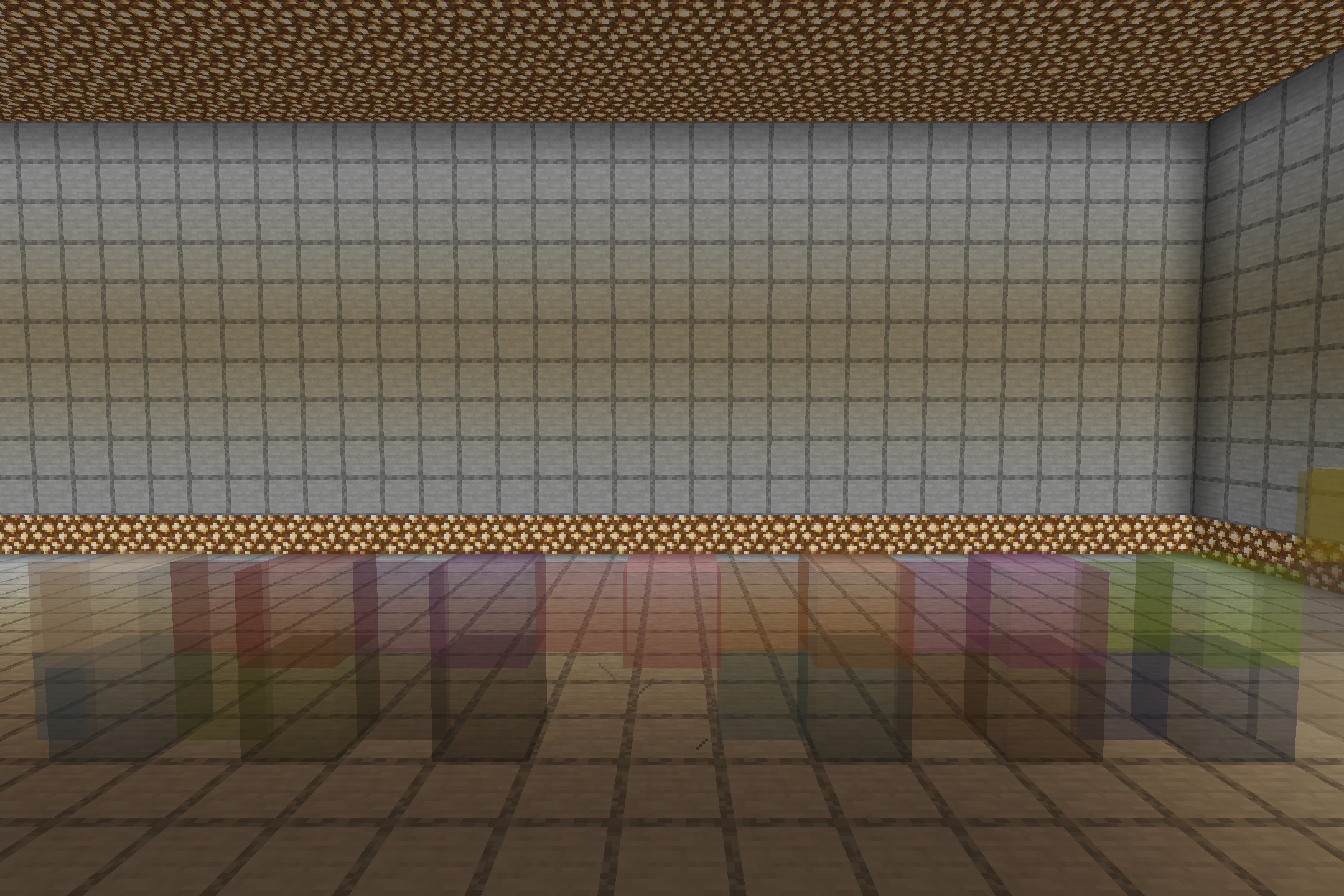 A room displaying various colored stained glass blocks with clear textures