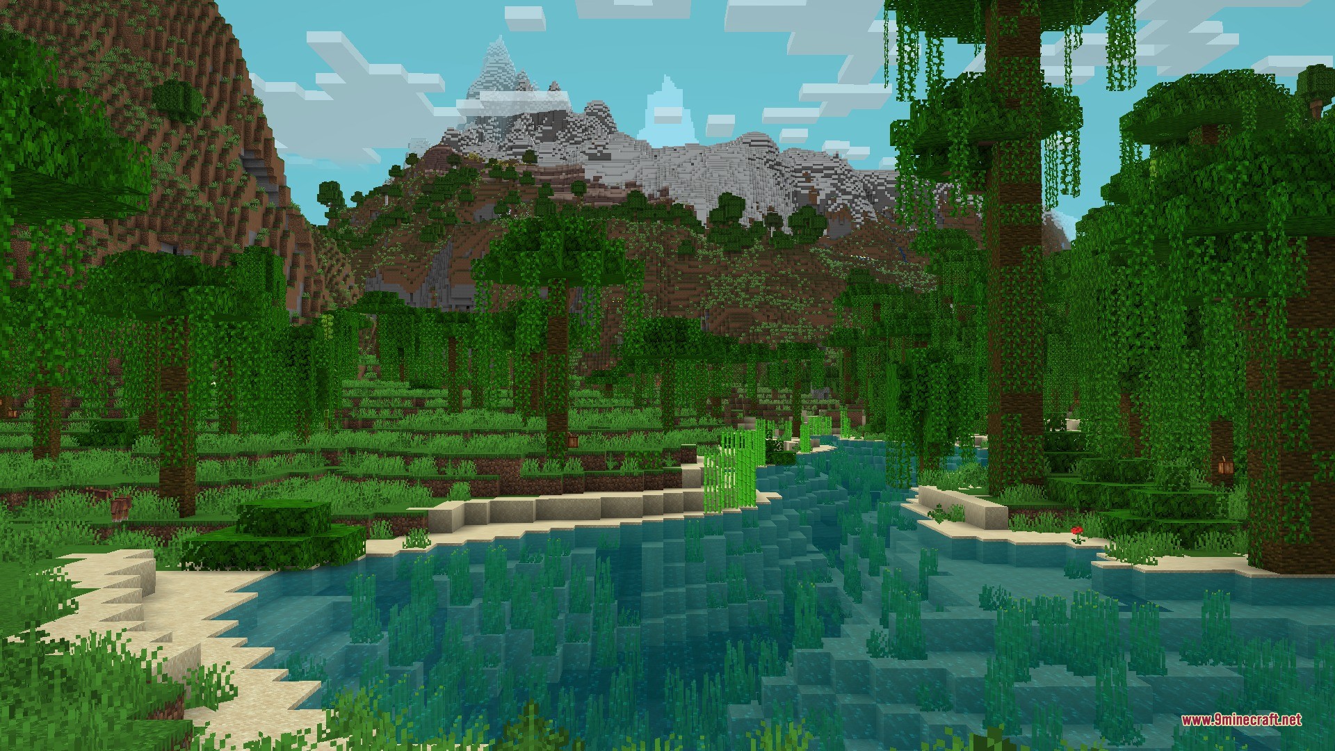 Cliff Under a Tree Cliff Tree Data Pack Screenshot 4 Lush jungle landscape with a clear river and snowy mountain peaks
