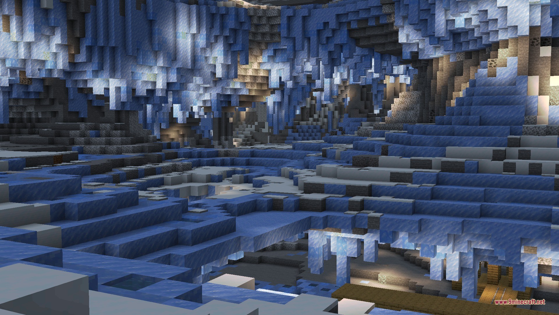 Cliff Under a Tree Cliff Tree Data Pack Screenshot 5 A massive frozen cave with blue ice stalactites and a wooden mineshaft
